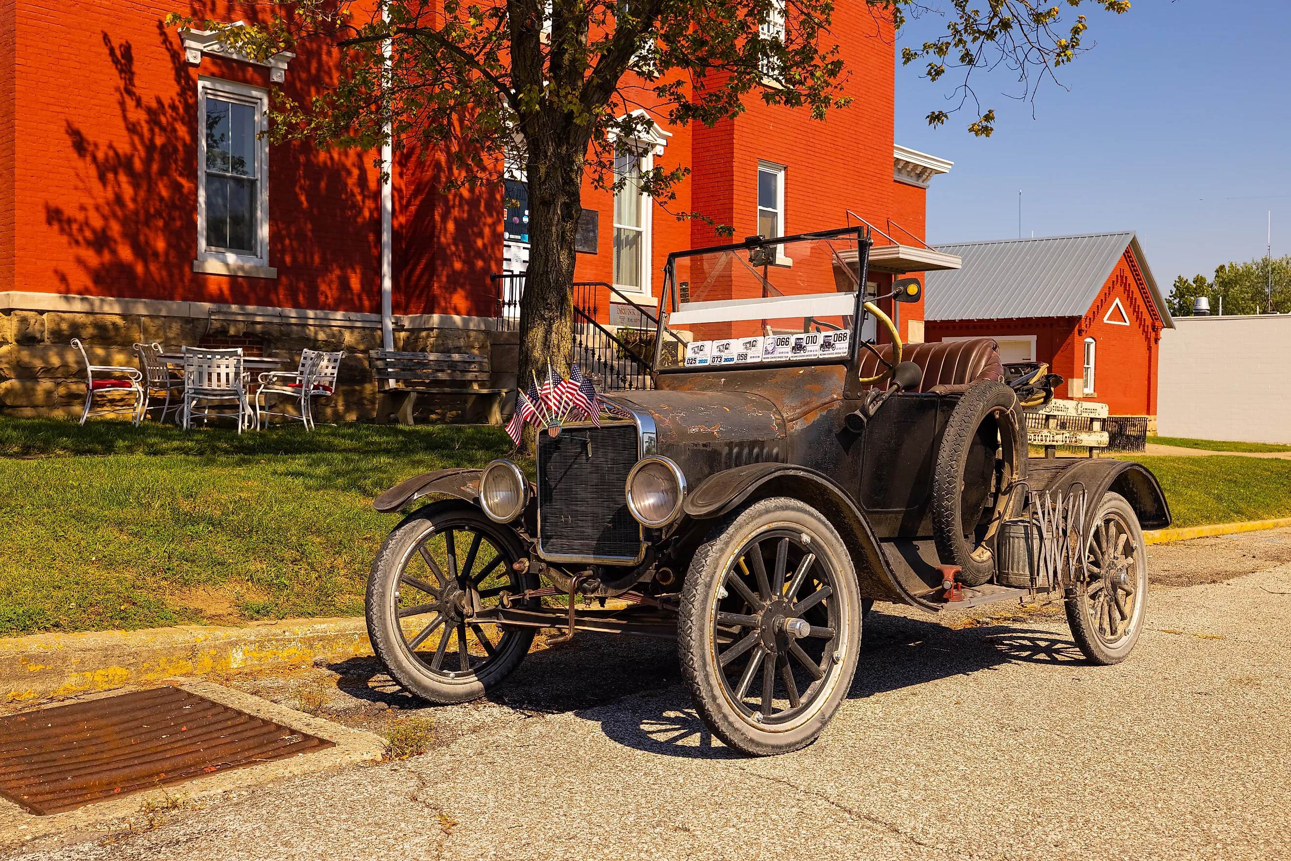 A 1930s Ford Model T parked in front of the Old Jail Inn in Rockville, Indiana. Image by Roberto Galan via Shutterstock.