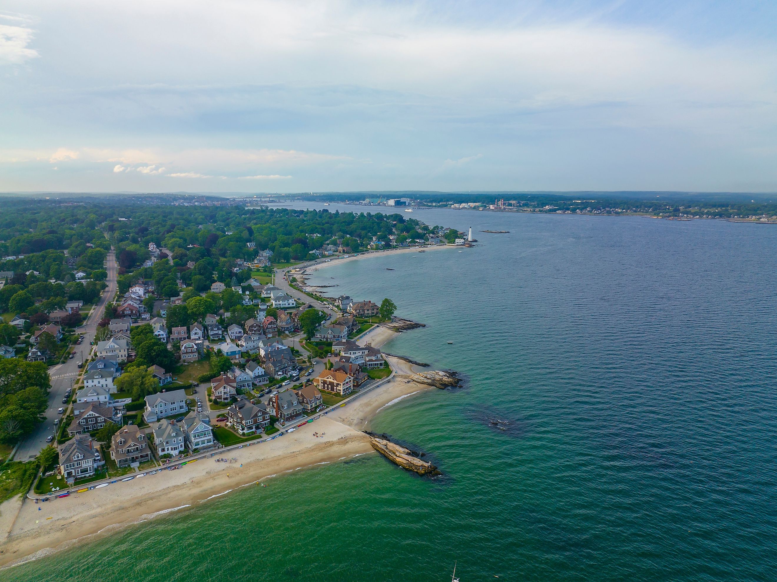 Pequot Point Beach and New London Harbor Lighthouse at the mouth of Thames River in city of New London, Connecticut.