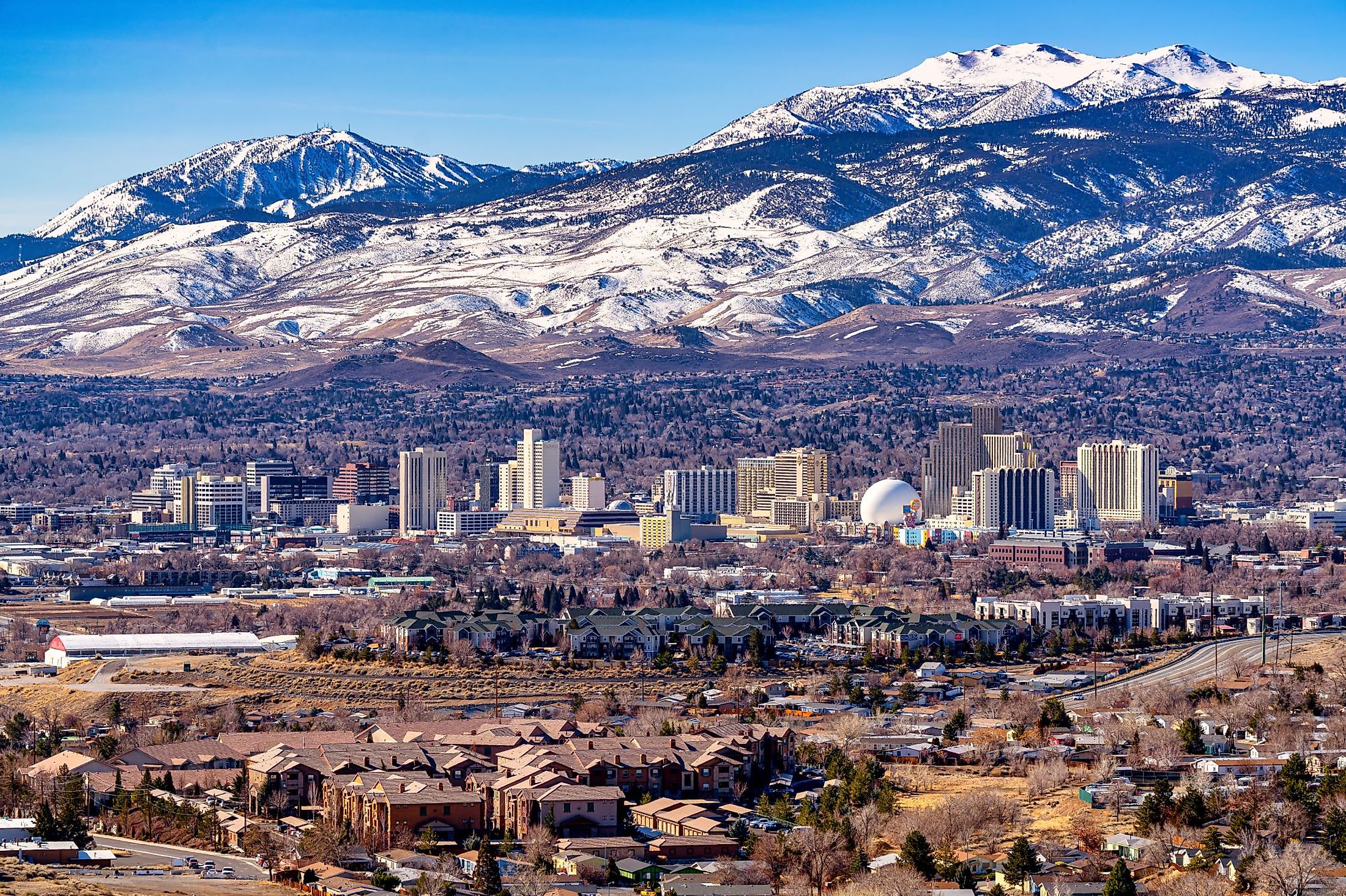 City of Reno, Nevada, cityscape showing the downtown skyline with hotels, casinos and surrounding residential area. Editorial credit: Gchapel / Shutterstock.com