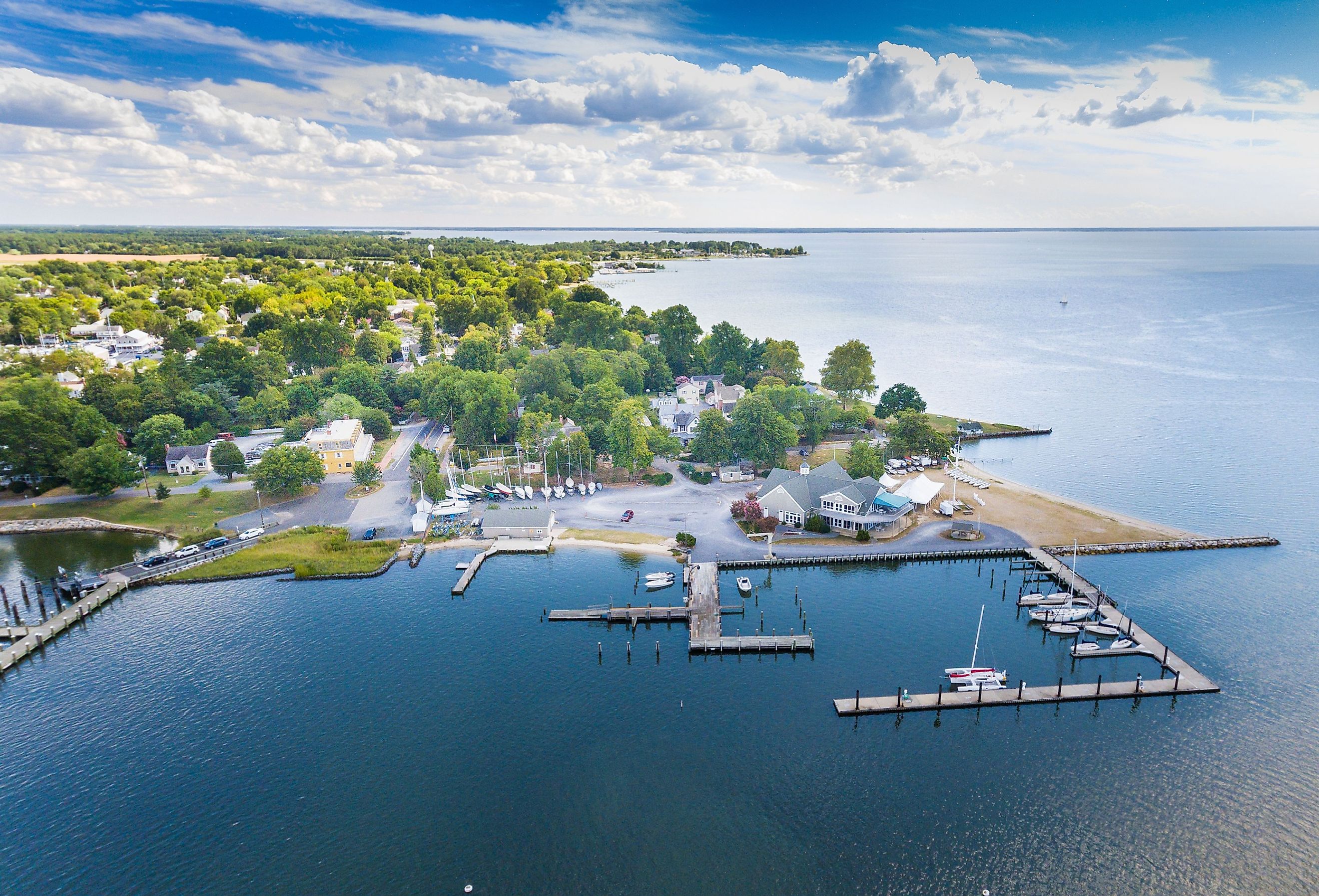 Aerial view of Oxford, Maryland on the Chesapeake Bay with clouds, water and shoreline.