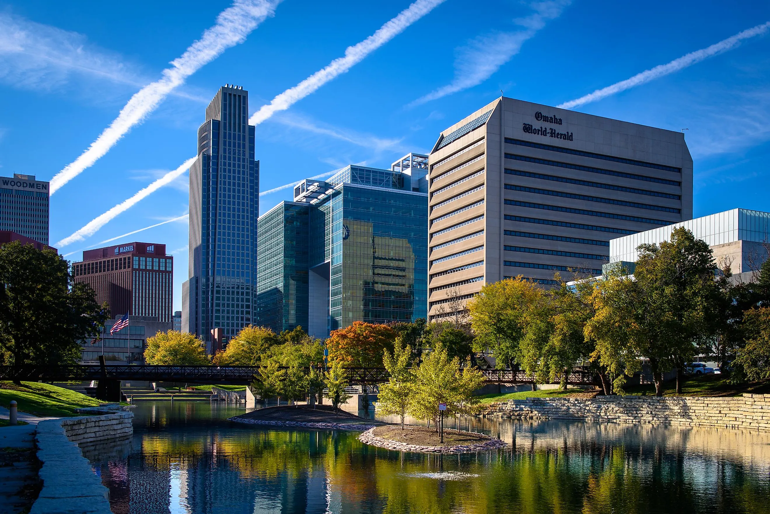 Omaha, NE - October 11, 2018: An evening view of the Omaha, Nebraska skyline from the Gene Leahy Mall. Editorial Role: Kristopher Kettner via Shutterstock.