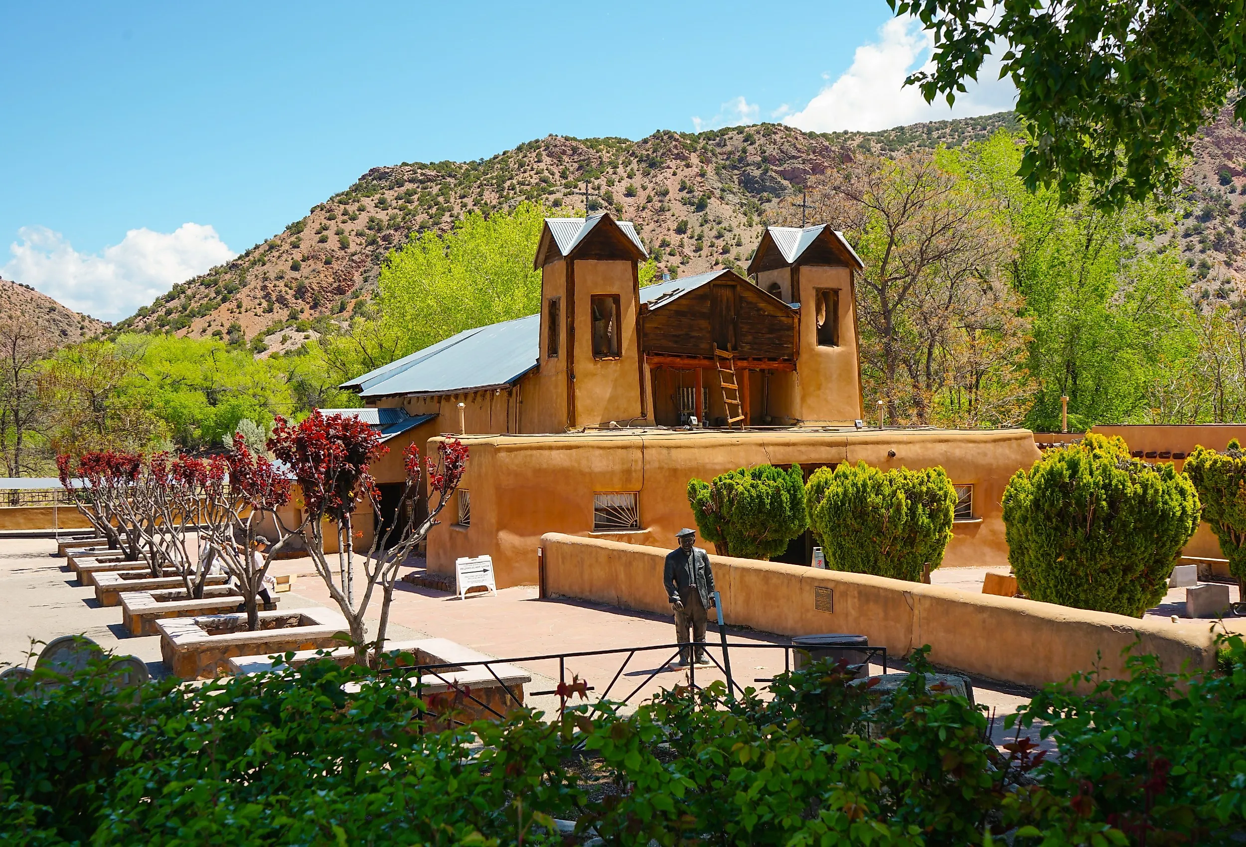 The grounds of El Santuario de Chimayo, New Mexico. Image credit RaisaMacouzet via Shutterstock