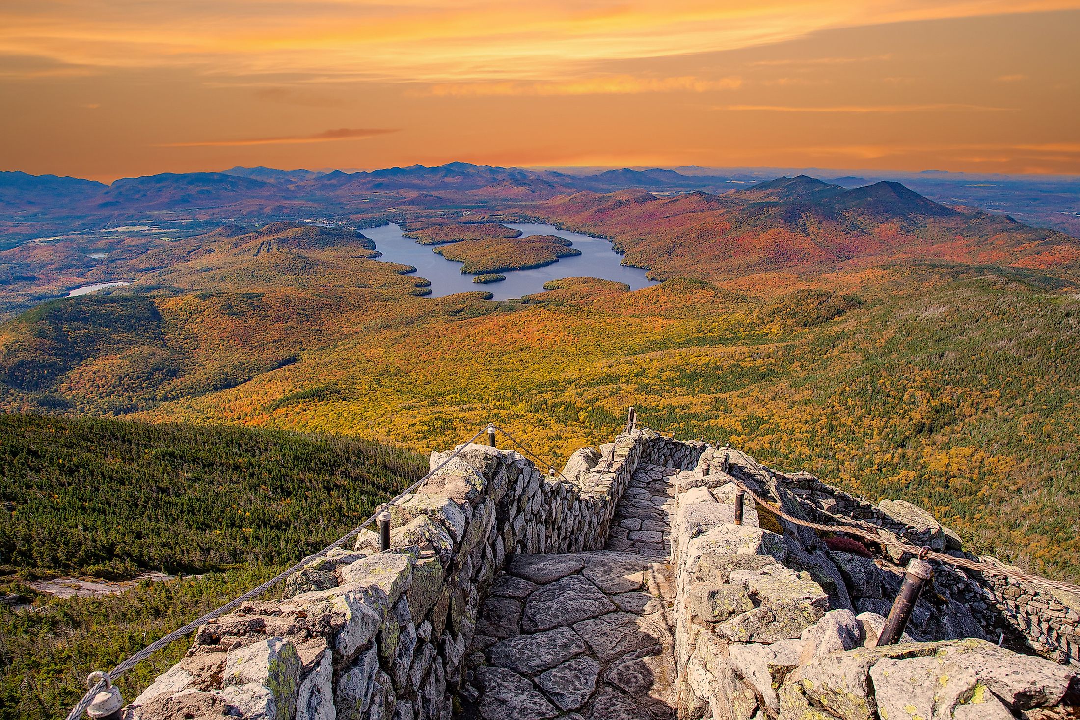 View of Lake Placid, New York and surrounding fall landscape from the mountain.