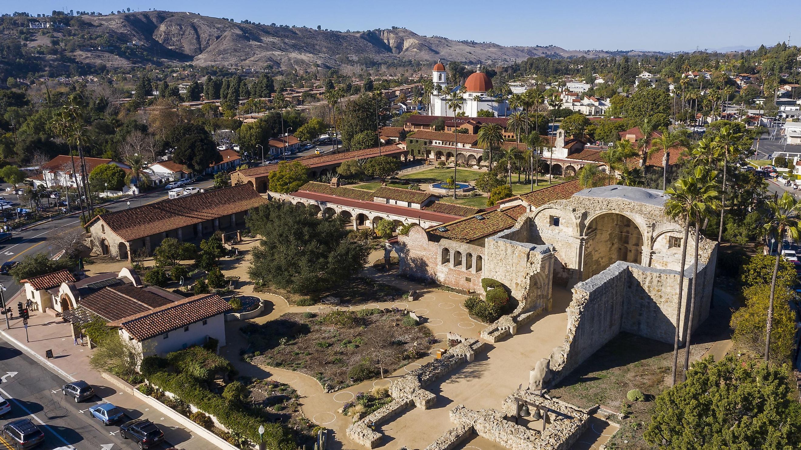 Daytime aerial view of the Spanish Colonial era mission and surrounding city of downtown San Juan Capistrano, California