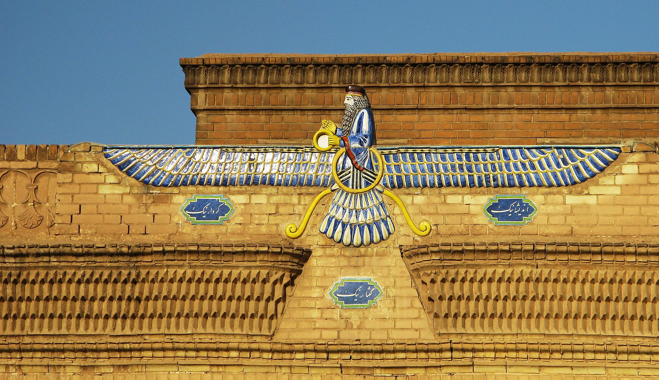 Faravahar, zoroastrian symbol on the temple wall, Yazd, Iran.
