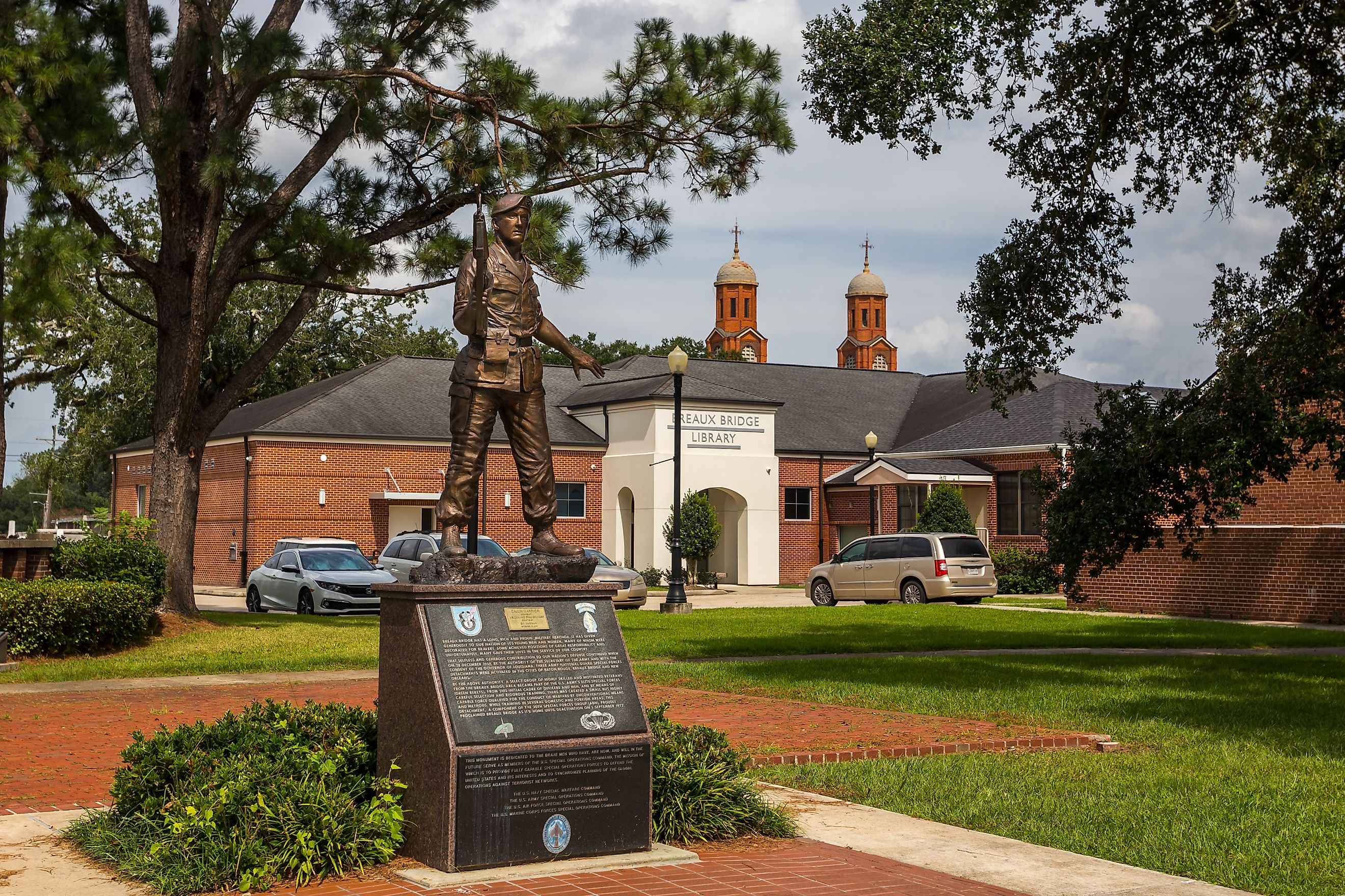 Statue near public library building, installed in honor of the Green Berets, in Breaux Bridge, Louisiana. Editorial credit: Victoria Ditkovsky / Shutterstock.com