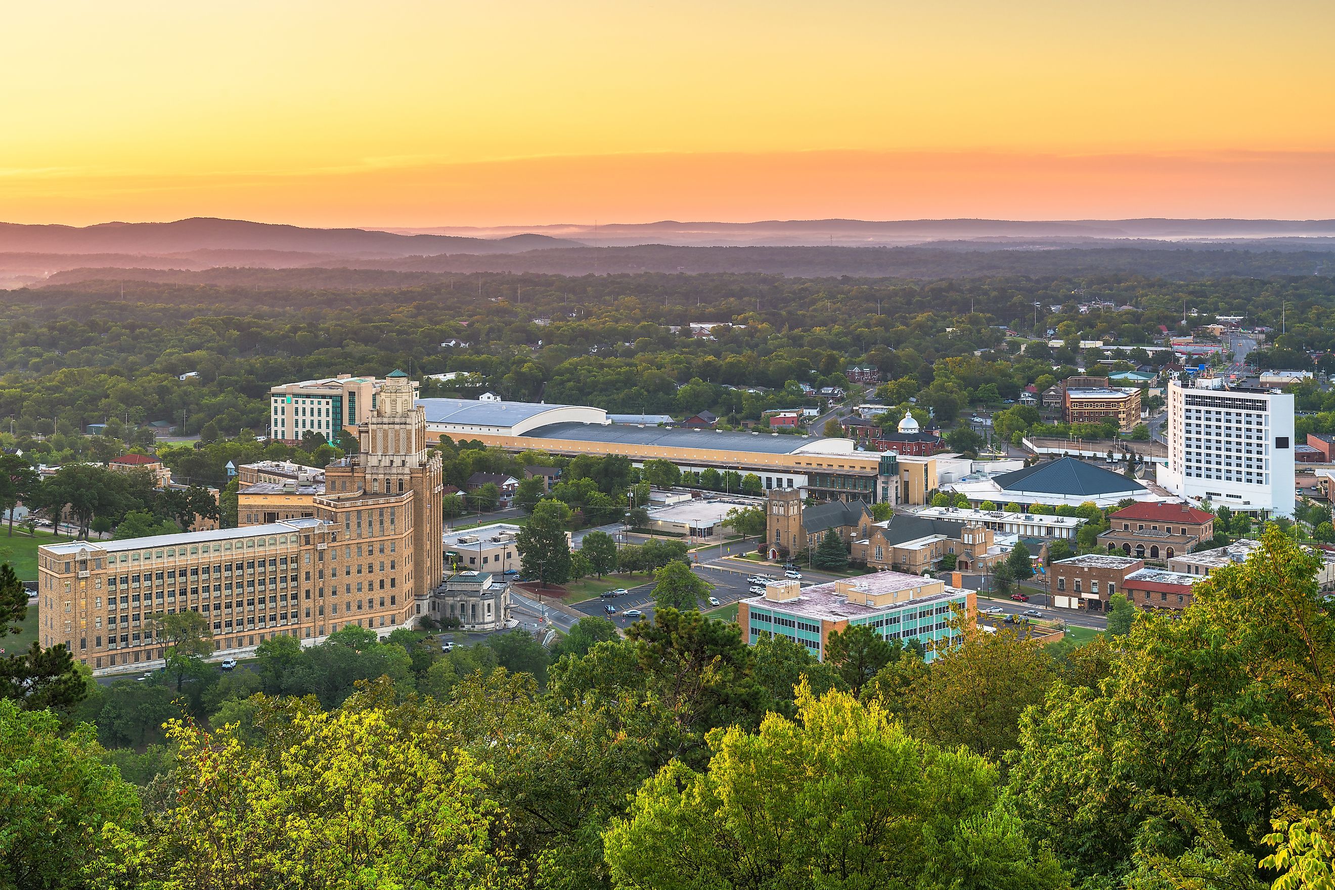 Hot Springs, Arkansas, USA town skyline from above at dawn.