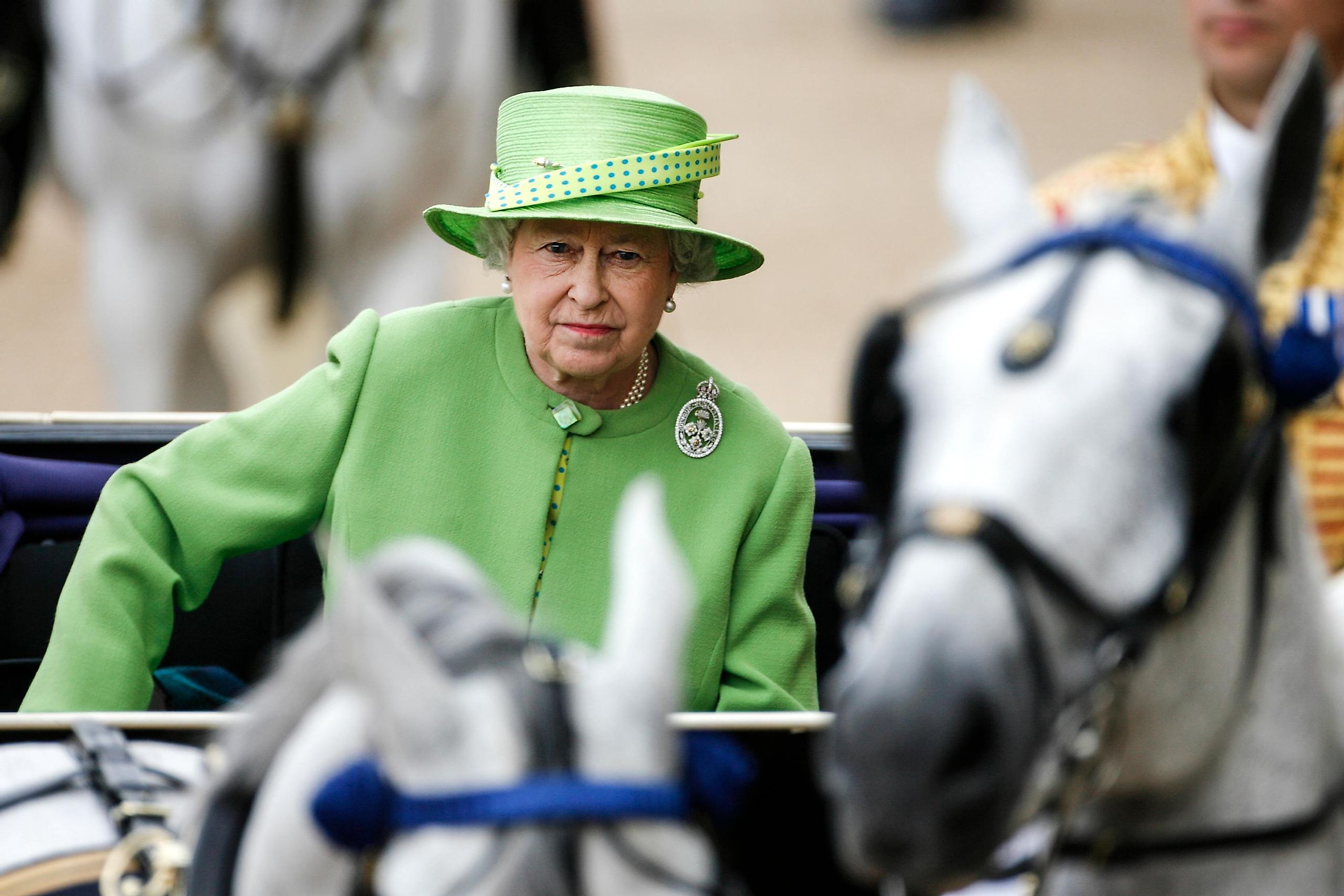 : Her Royal Highness Queen Elizabeth II travels by carriage during the Trooping the Colour ceremony. Editorial credit: Alessia Pierdomenico / Shutterstock.com