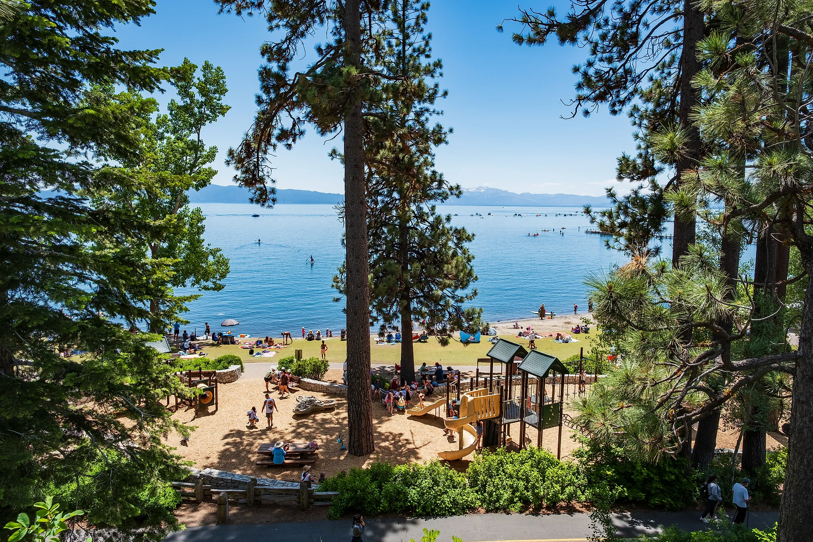 Tahoe City, California: People enjoying the summer weather at Commons Beach on the shores of Lake Tahoe.