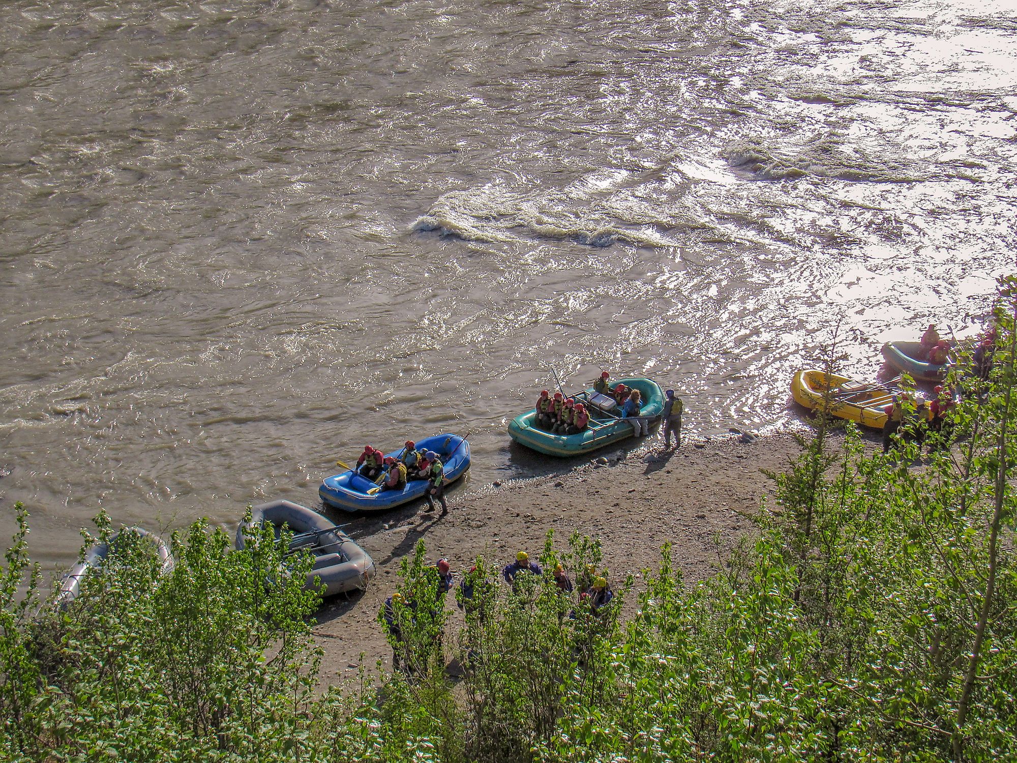 Tourists rafting on the Nenana river, near Denali Park, Alaska. Image credit: Rosamar/Shutterstock.com