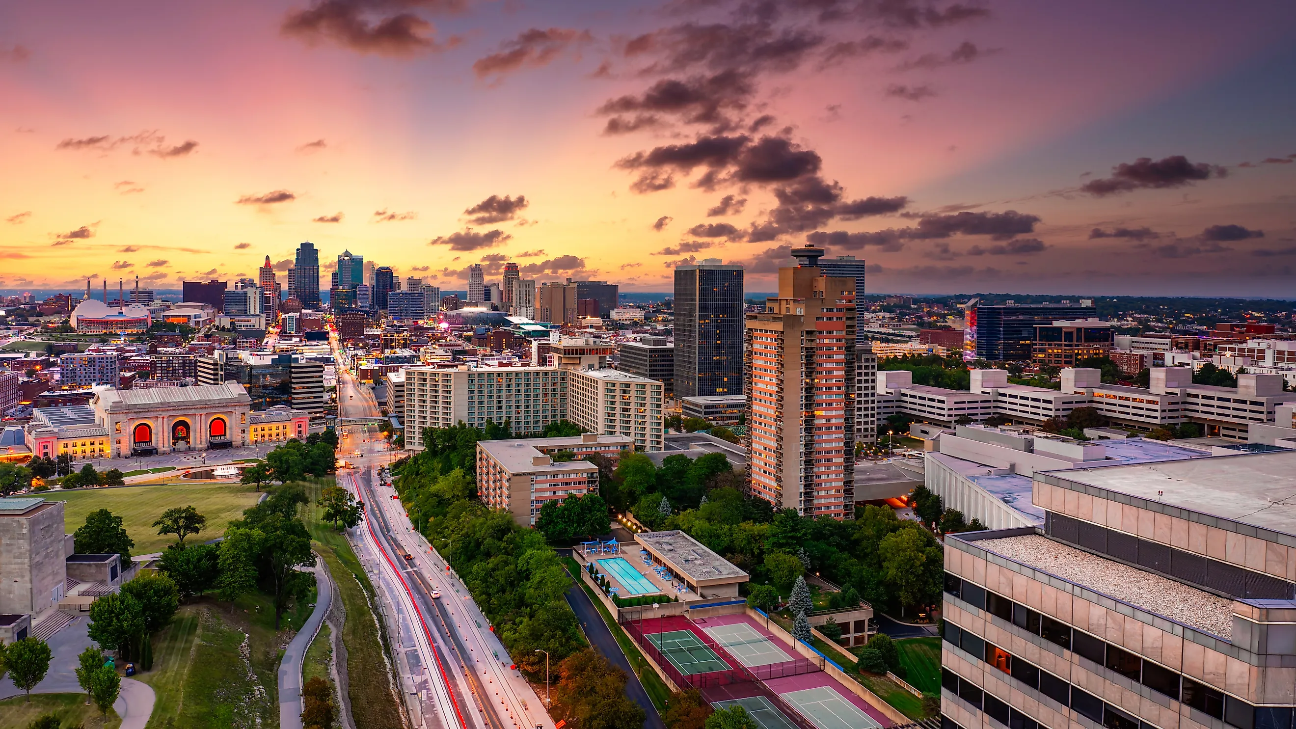 Aerial view of Kansas City skyline at dusk, viewed from Penn Valley Park.