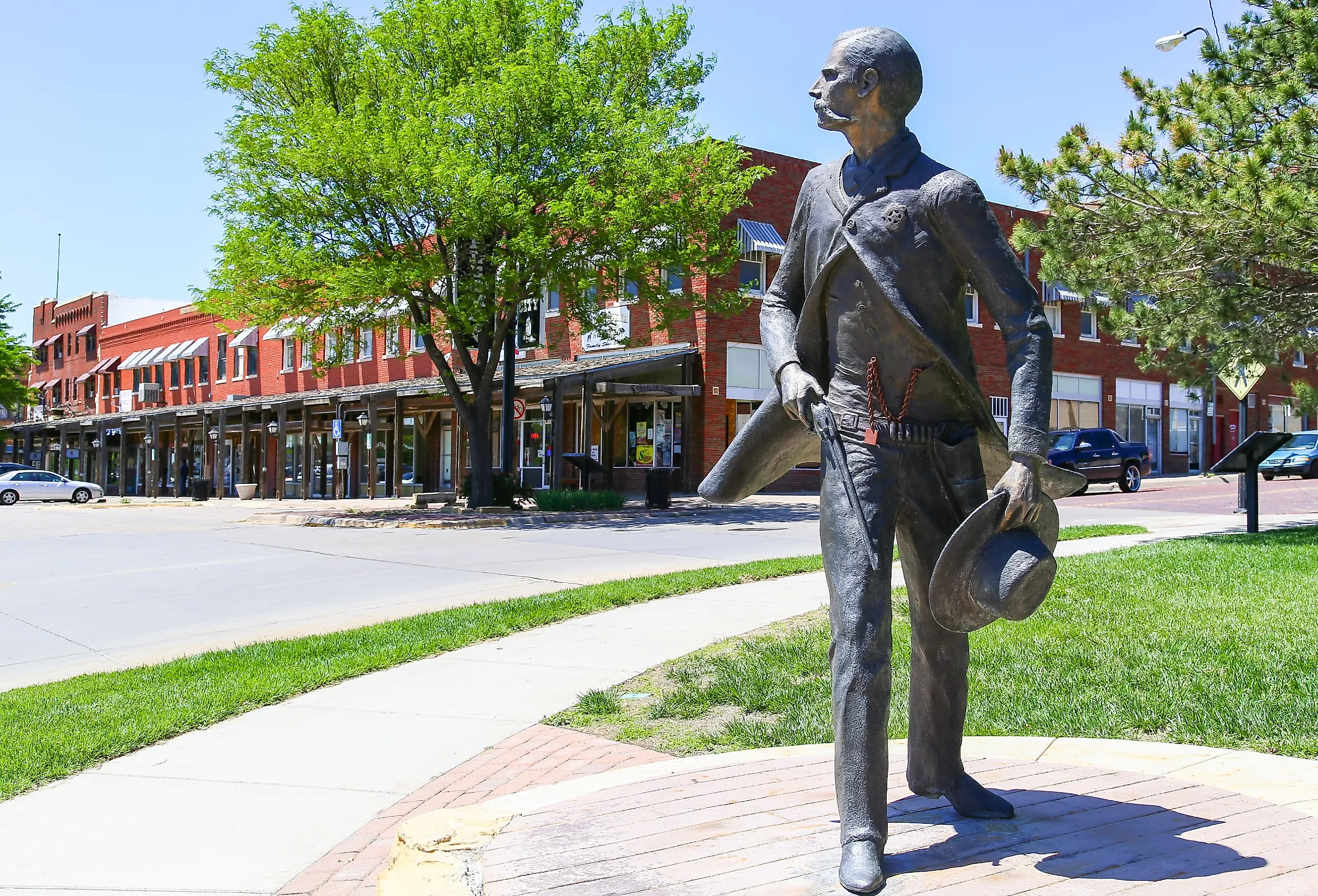 Bronze sculpture of Wyatt Earp as part of the Trail of Fame in the historic district of Dodge City, Kansas. Image credit Michael Rosebrock via Shutterstock.com