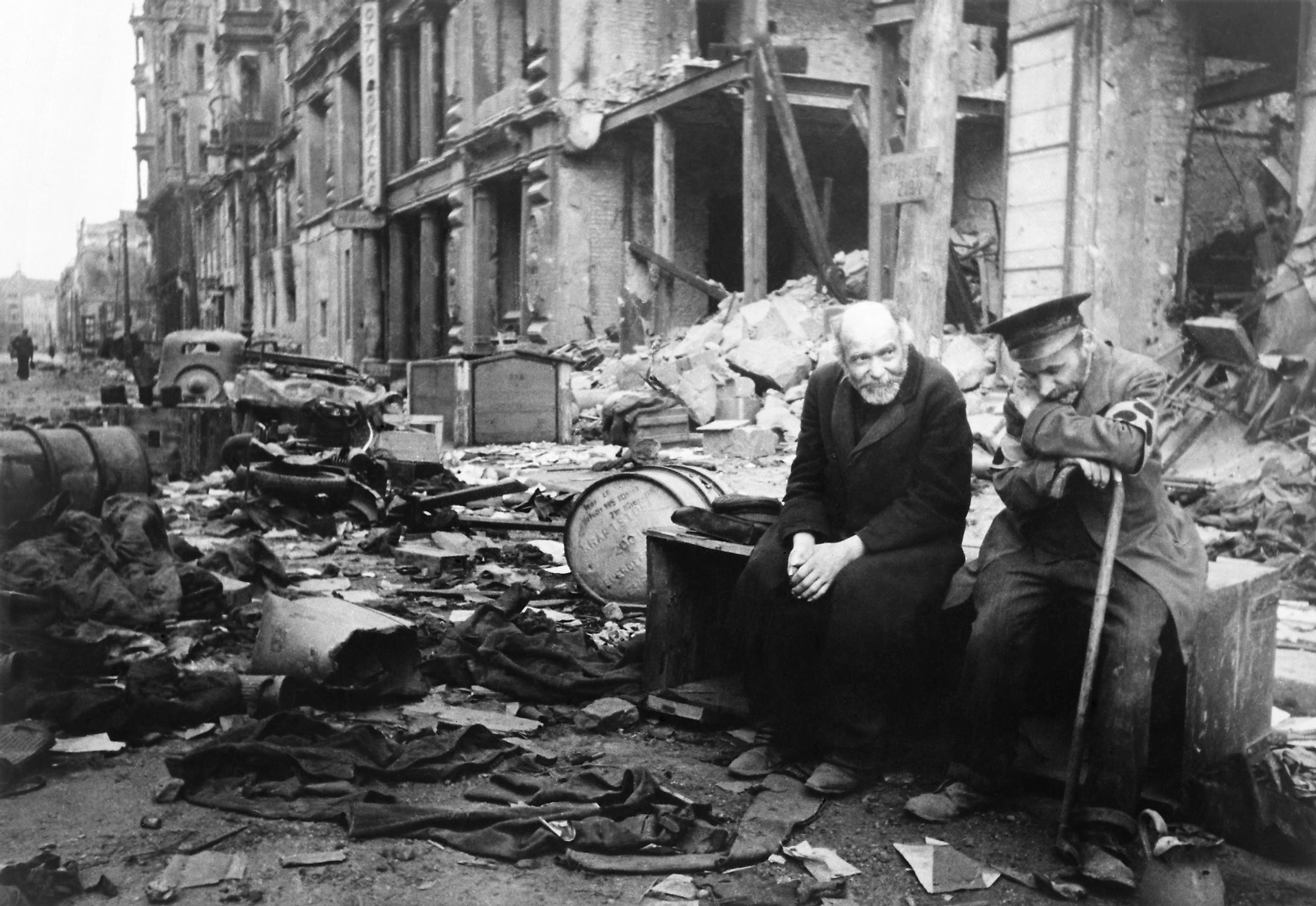 Two aged men lamenting on the destruction of Berlin.