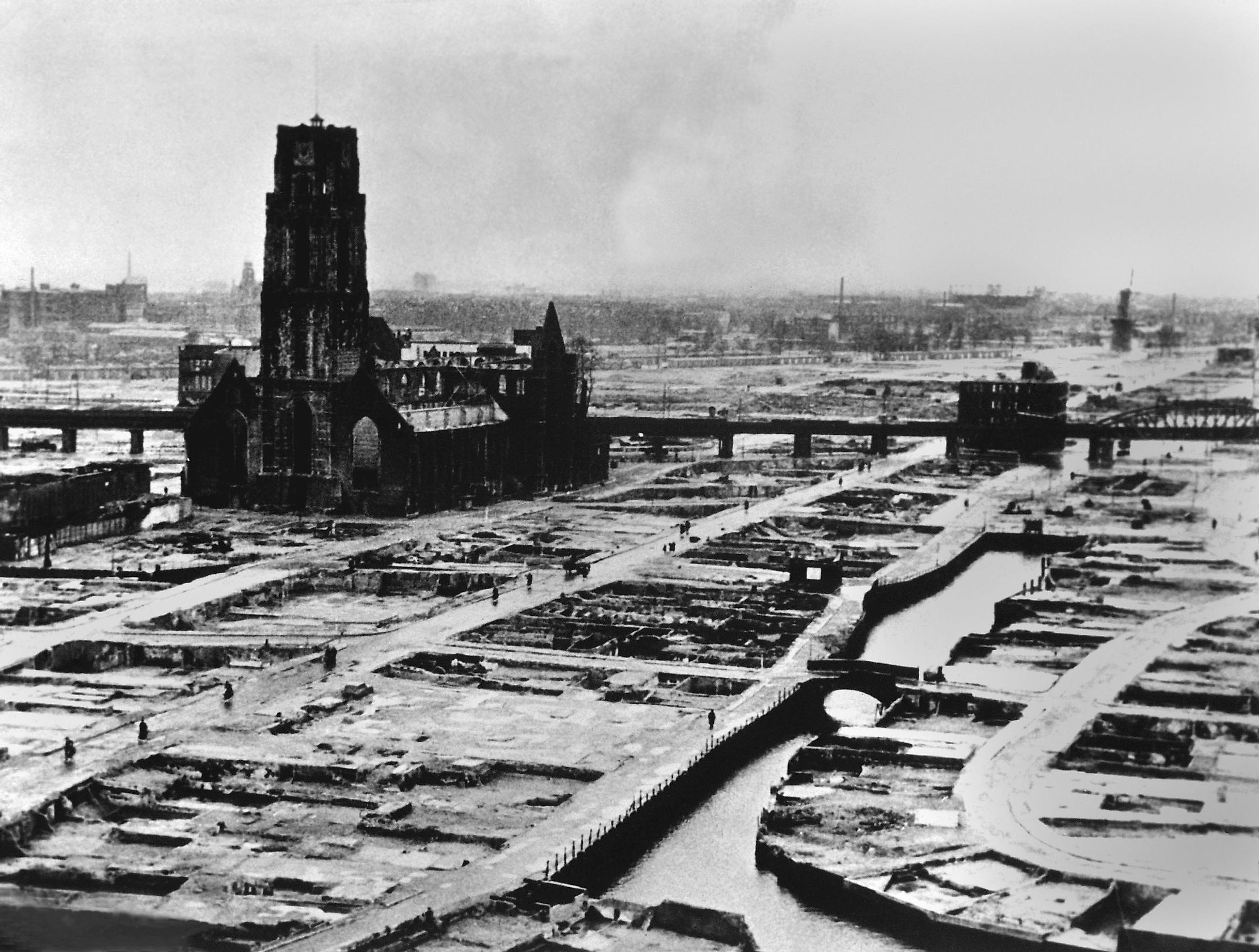 Rotterdam after the entire inner city was bombed by Germans, May 14, 1940. 30,000 civilians were killed when the Dutch defenders refused a German ultimatum to cease defense and surrender.