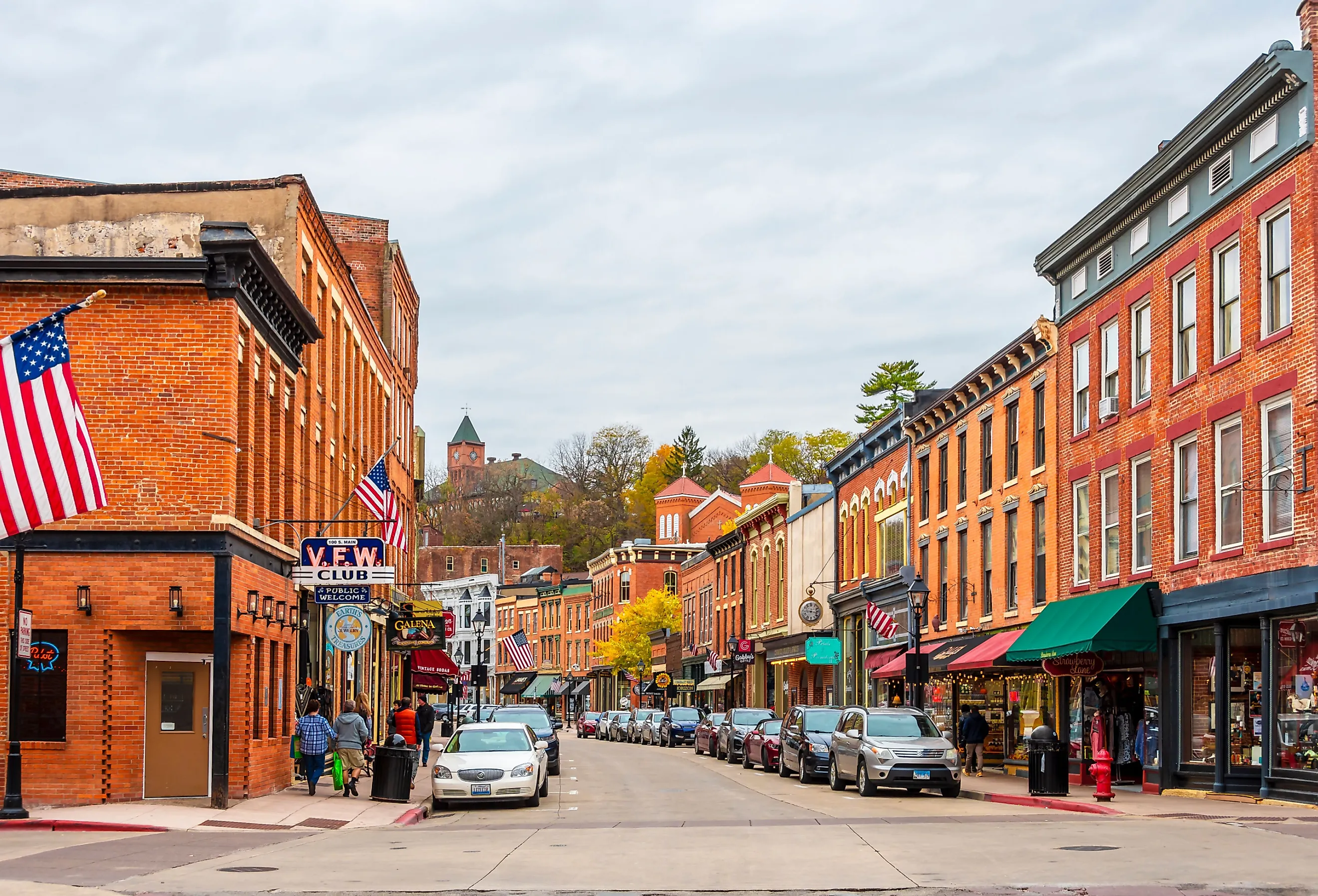 People walking down the sidewalks on historical Main Street in Galena, Illinois. Image credit Nejdet Duzen via Shutterstock