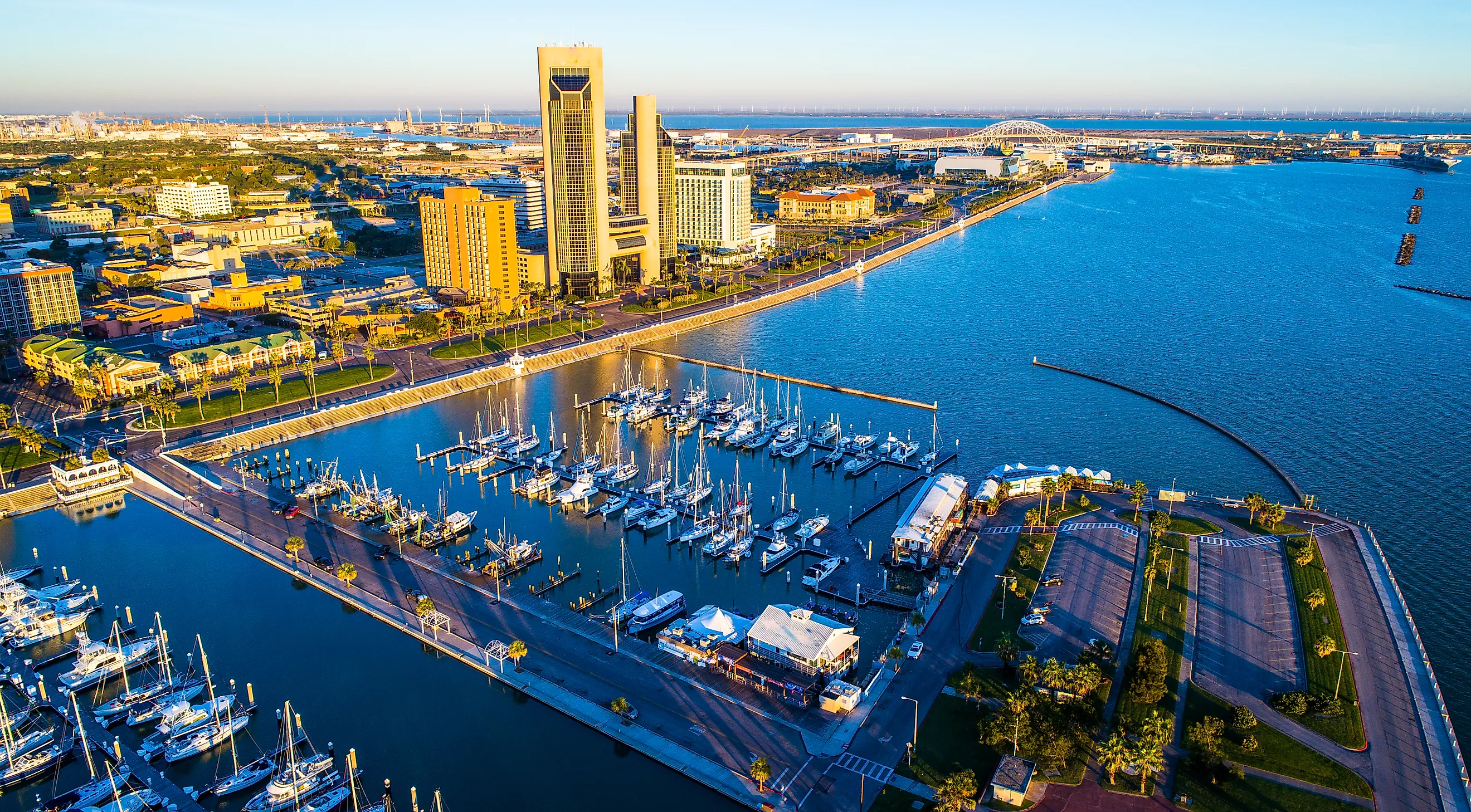 r Corpus Christi Texas bayfront harbor and marina aerial drone view high above Gulf of Mexico coastal bend city skyline cityscape with Harbor Bridge