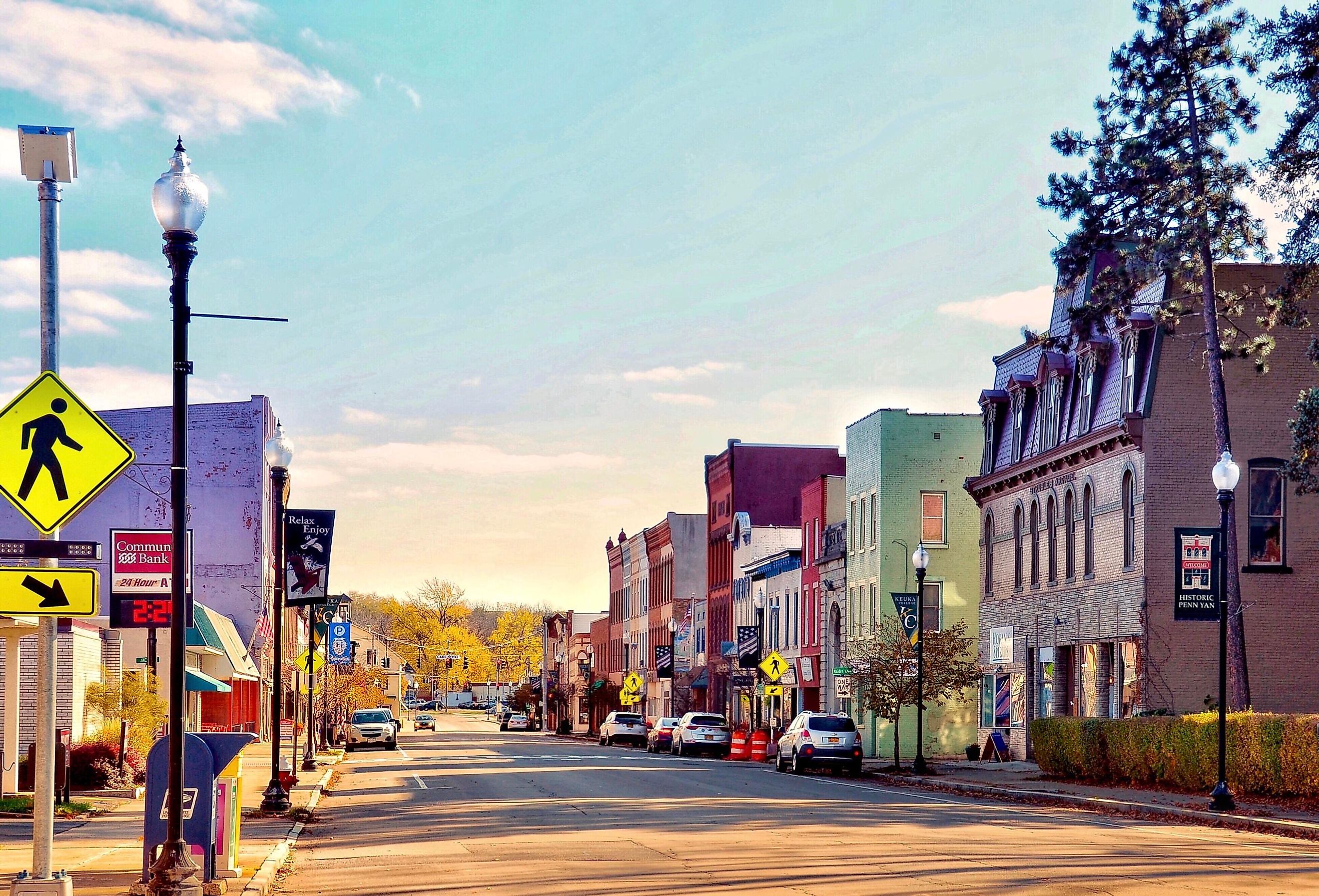 Penn Yan Historic District, Penn Yan, New York, USA. Sign of ATM from 'Community Bank' on the left, Victorian commercial building of Struble's Arcade on the right. Editorial credit: PQK / Shutterstock.com