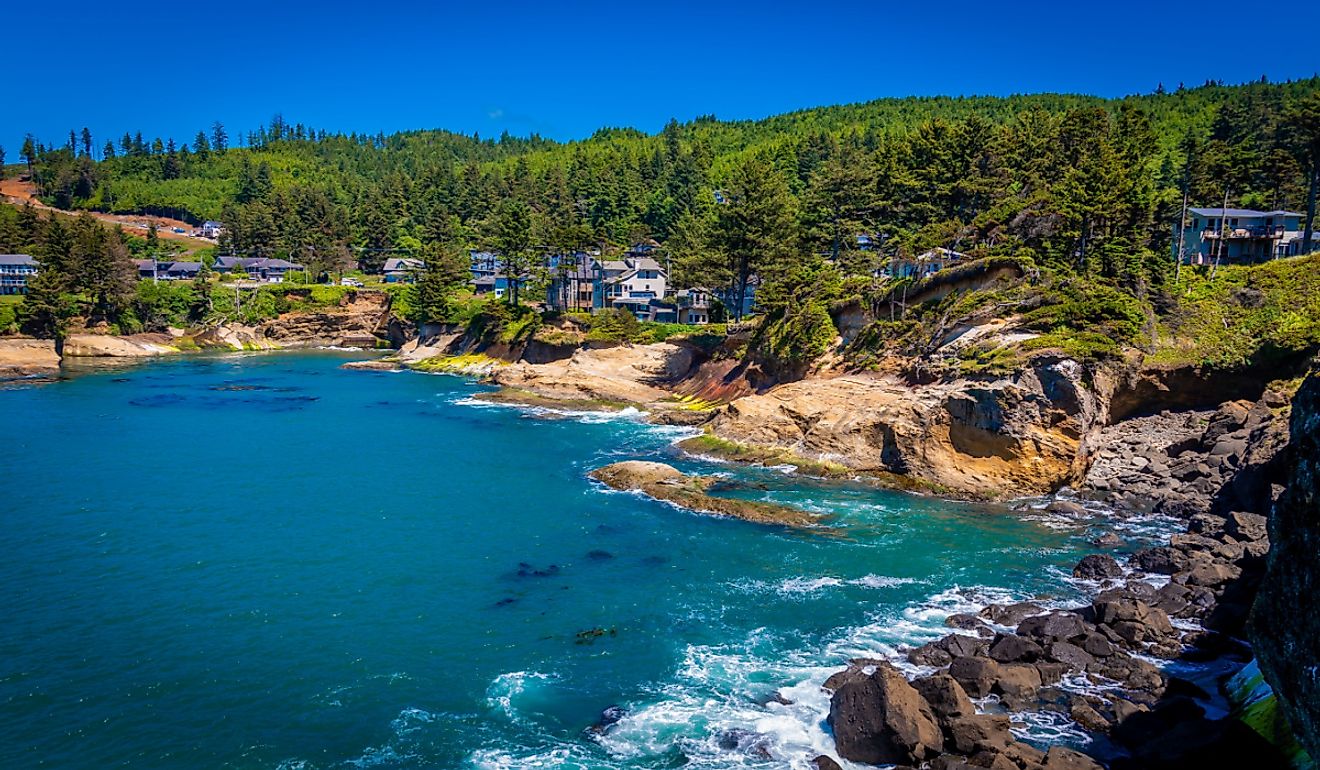 Aerial shot of Depoe Bay in Orgeon and its crystal blue waters