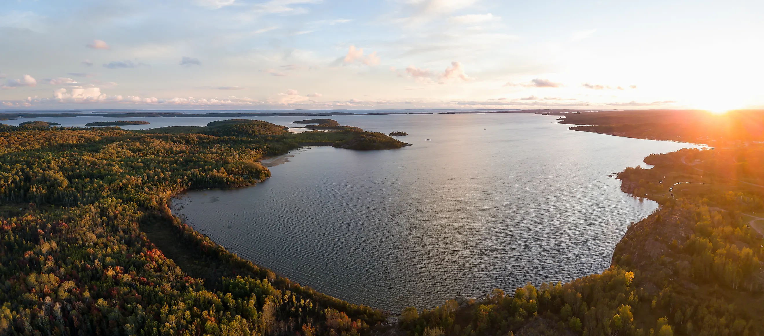 Aerial panoramic landscape view of a beautiful bay on the Great Lakes, Lake Huron. Image Credits: EB Adventure Photography via Shutterstock