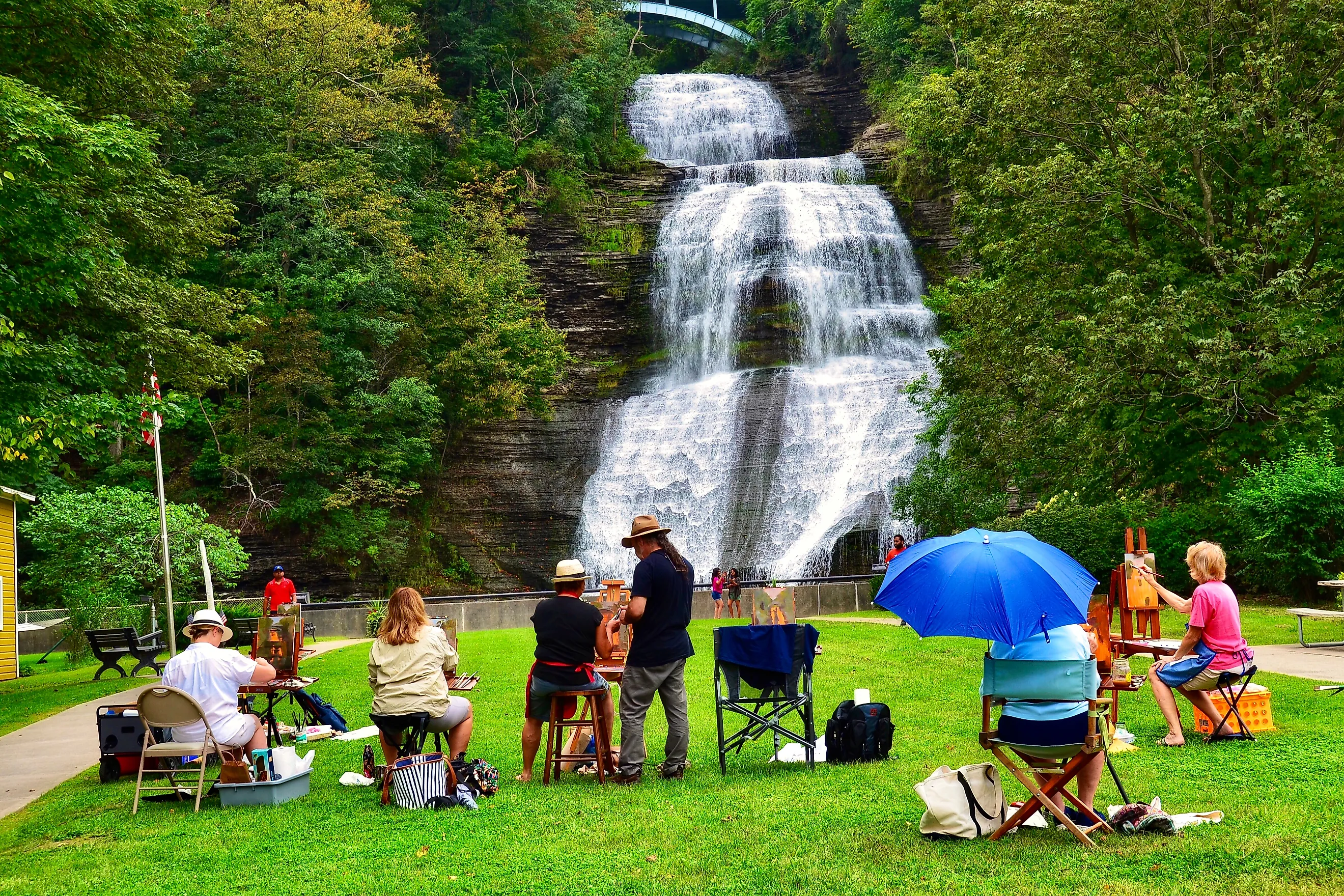 Montour Falls: A group of grown up students attending an art painting class, in the Shequaga Falls Park. Continued education, art school, people concept. Editorial Photo Credit: PQK Shutterstock.