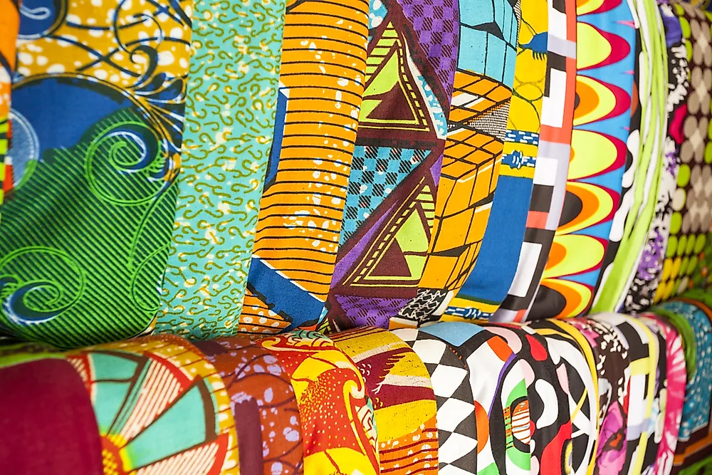 Traditional fabrics sold in a marketplace in Ghana.