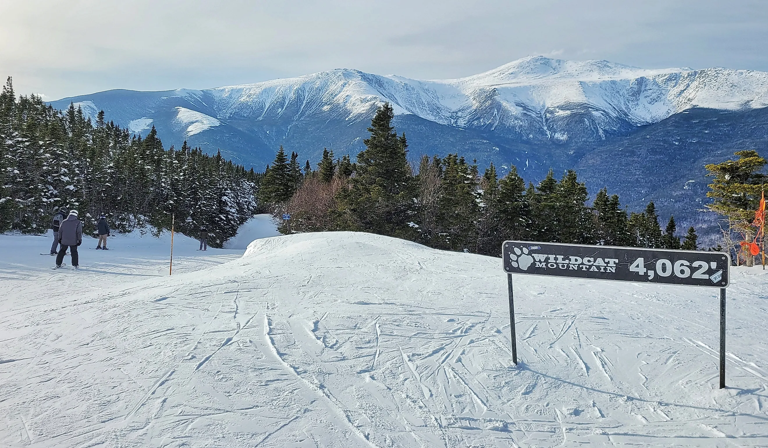 Wildcat Mountain ski area New Hampshire in winter with skiers.