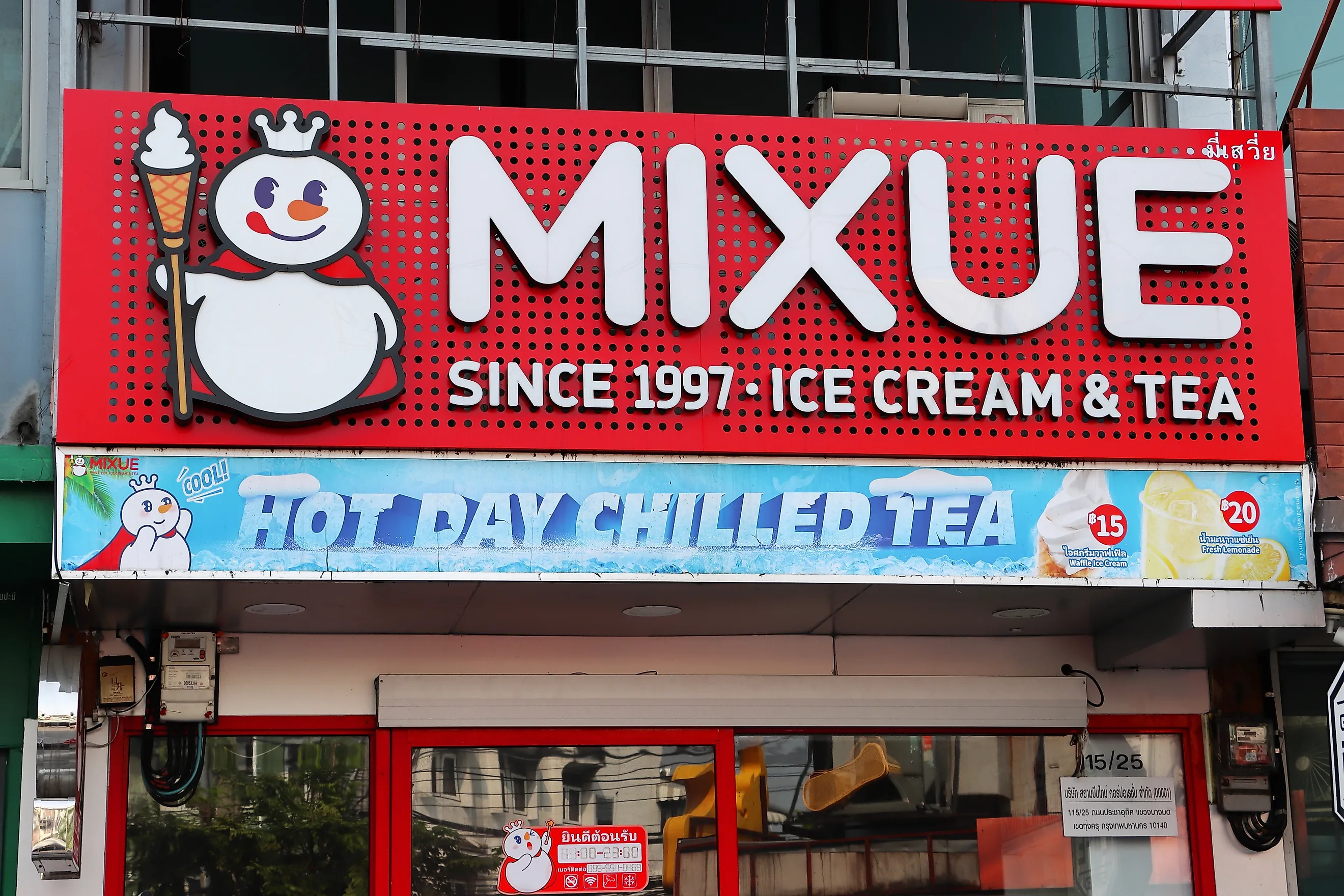 Mixue ice cream and tea cafe signage. Editorial credit: Opasbbb / Shutterstock.com