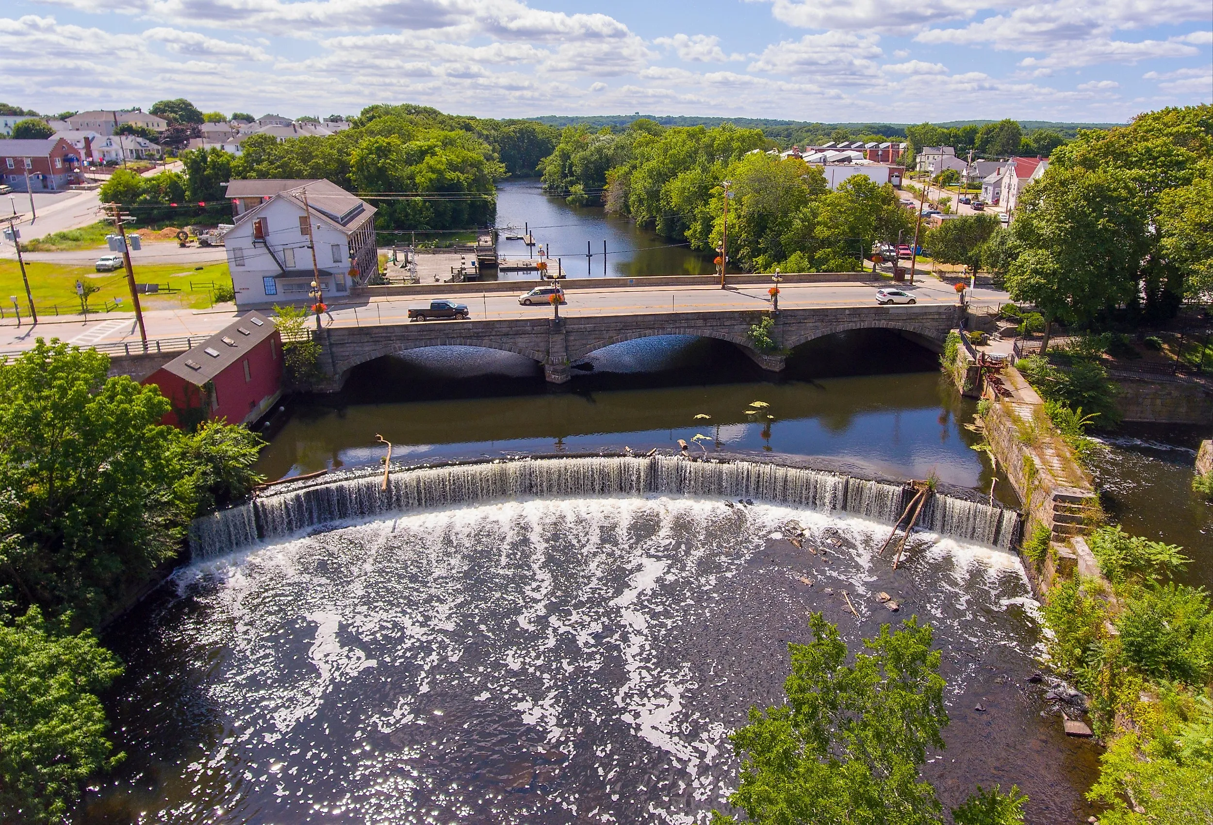 Valley Falls and Board Street bridge over Blackstone River at Valley Falls Heritage Park, Central Falls, Rhode Island.