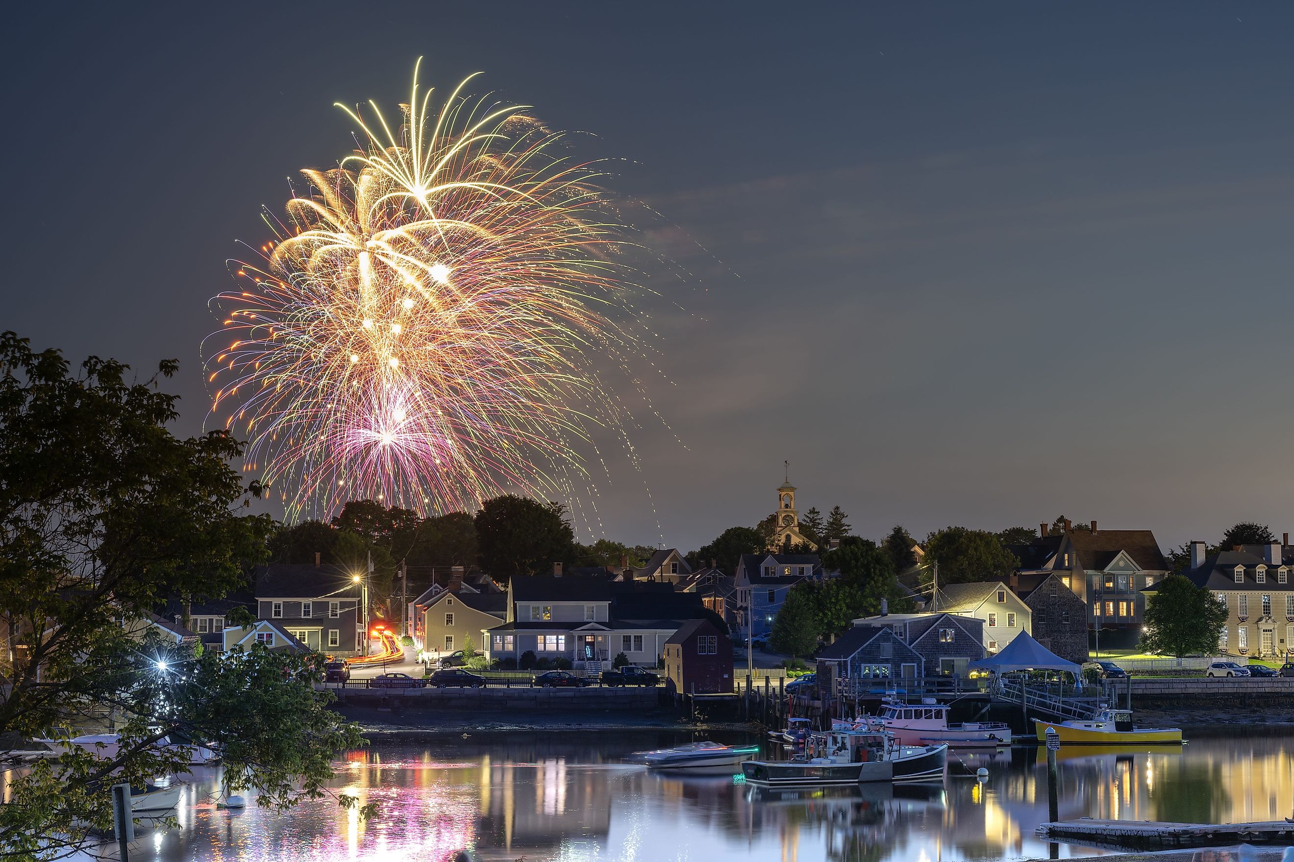 4th of July Fireworks showing homes along the historic waterfront, NH, USA. Image credit: Actium via Shutterstock