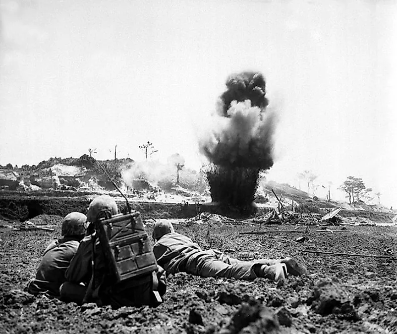 A U.S. Marine Corps demolition crew destroys a Japanese position during the Battle of Okinawa.