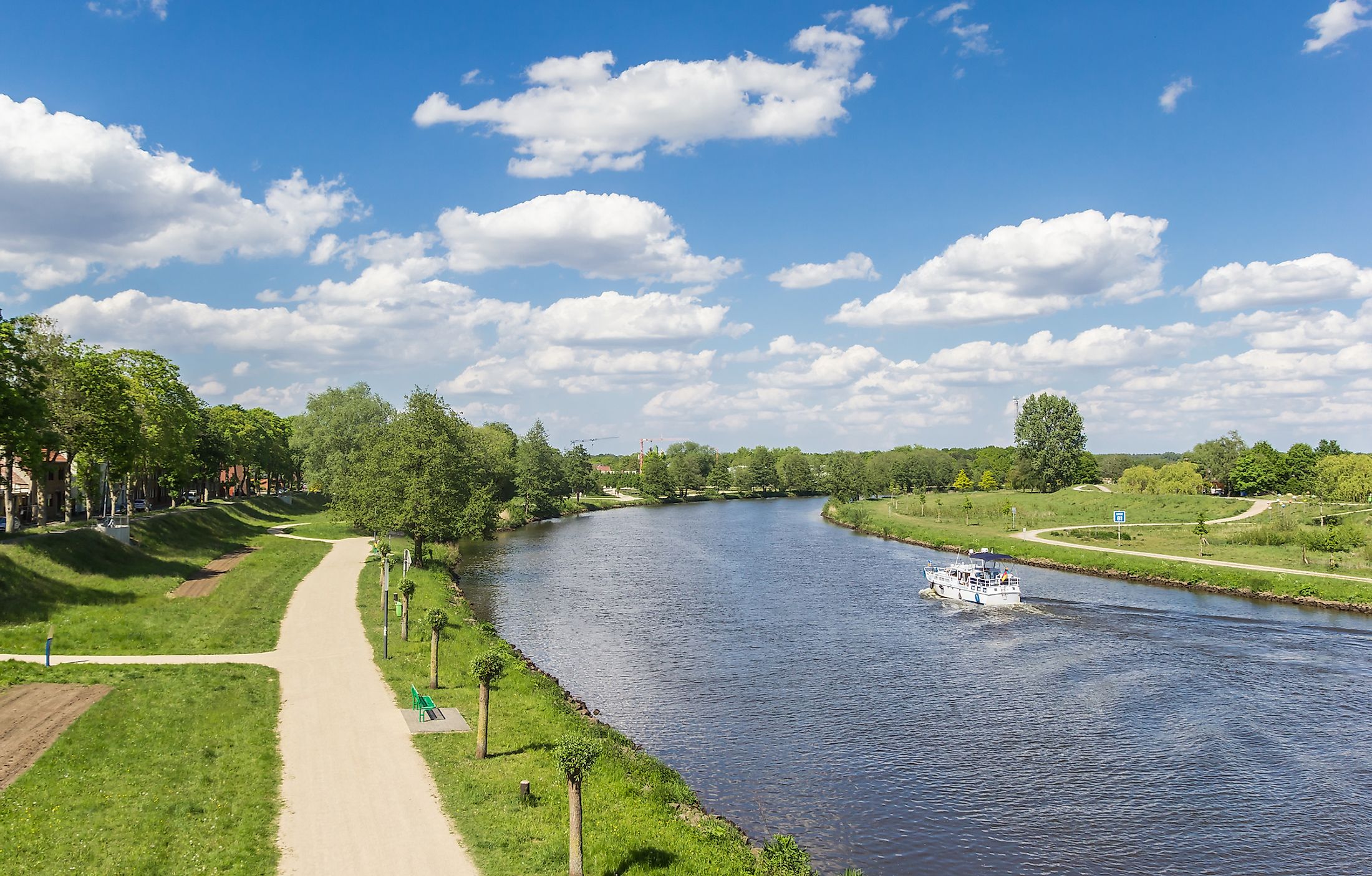 Bicycle path along the river Ems in Haren, Germany.
