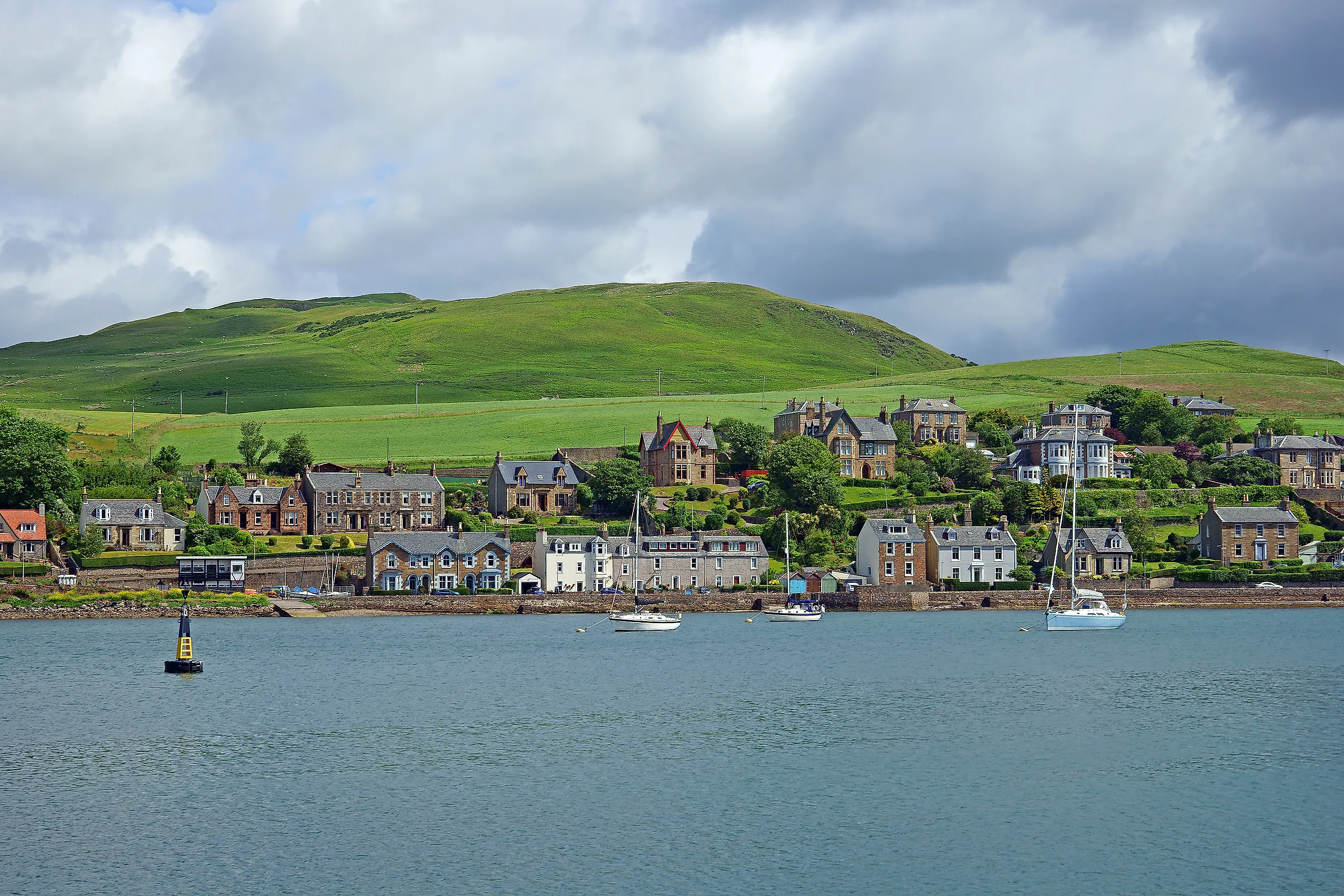 The tranquility of Campbeltown harbour in summer, Argyll and Bute, Scotland.