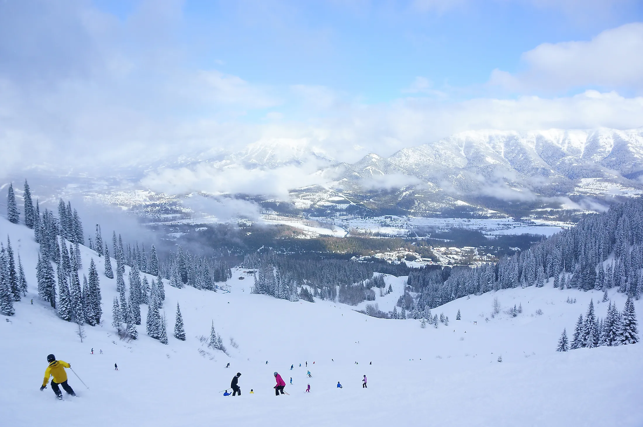 Skiers are skiing and having fun at the Fernie Ski Resort, Fernie, British Columbia, Canada. Editorial credit: Timothy Yue / Shutterstock.com