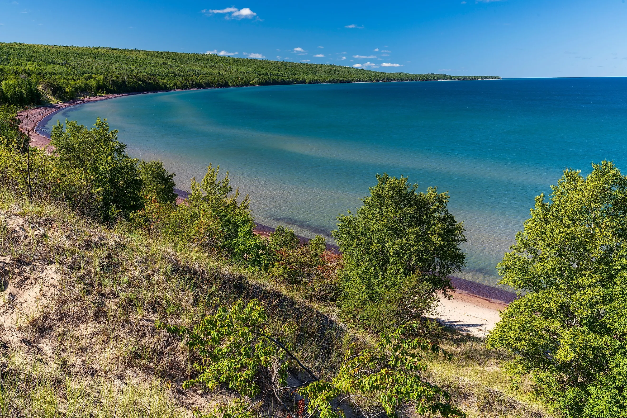A high angle of Great Sand Bay of Lake Superior covered with greenery on Keweenaw peninsula, Michigan. 