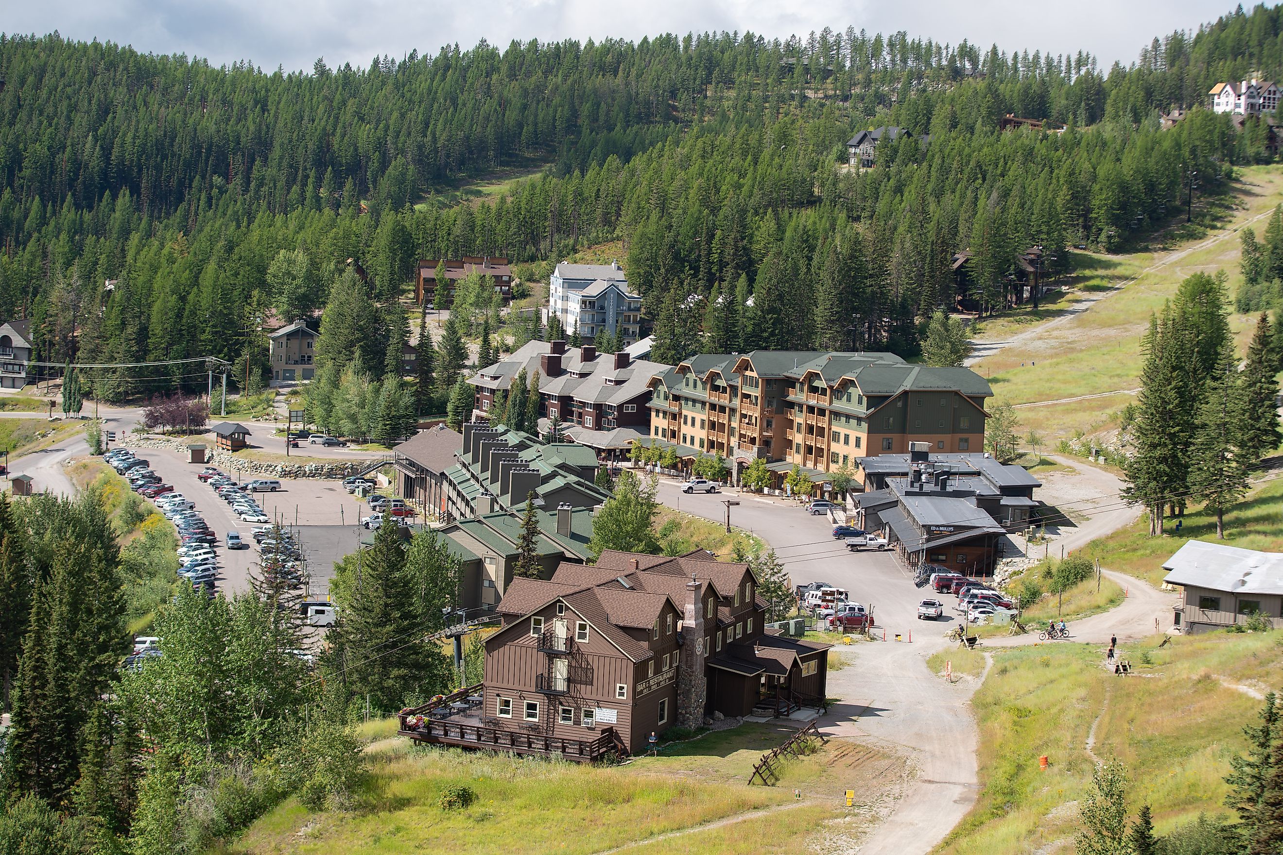 Whitefish Resort, MT / USA - August 19 2019: Mountain ski resort, aerial view during summer day.