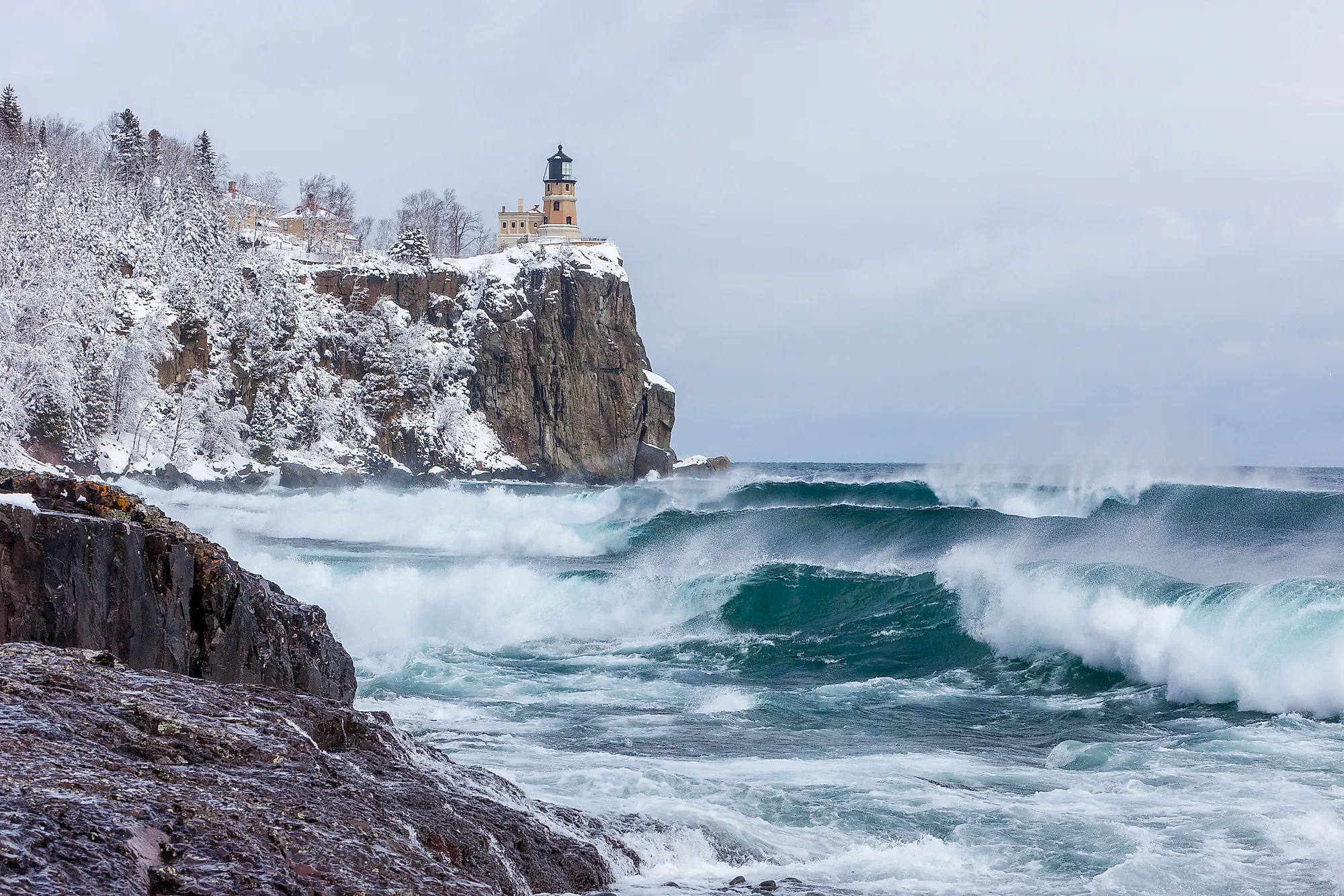 Lake Superior waves roll onto the shoreline at Split Rock Lighthouse in Minnesota.