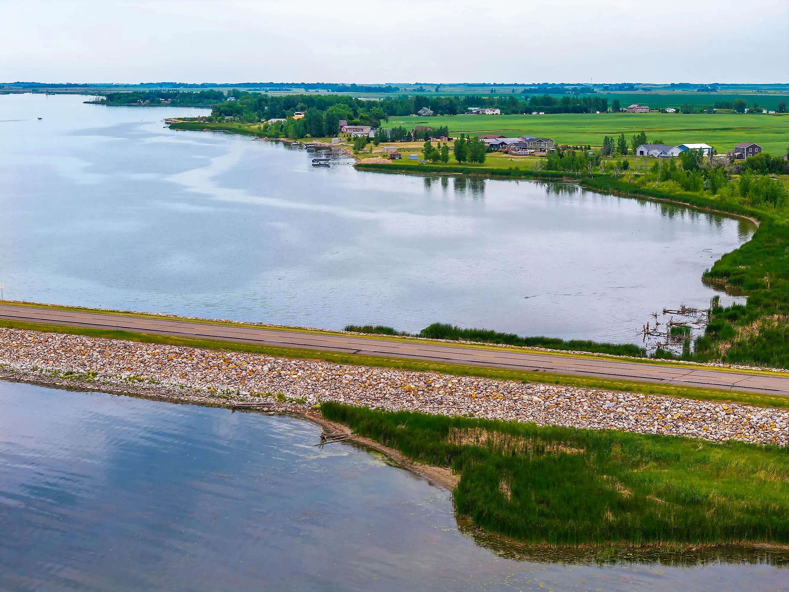 A road extending into Devils Lake, North Dakota, connecting the mainland to Grahams Island State Park.