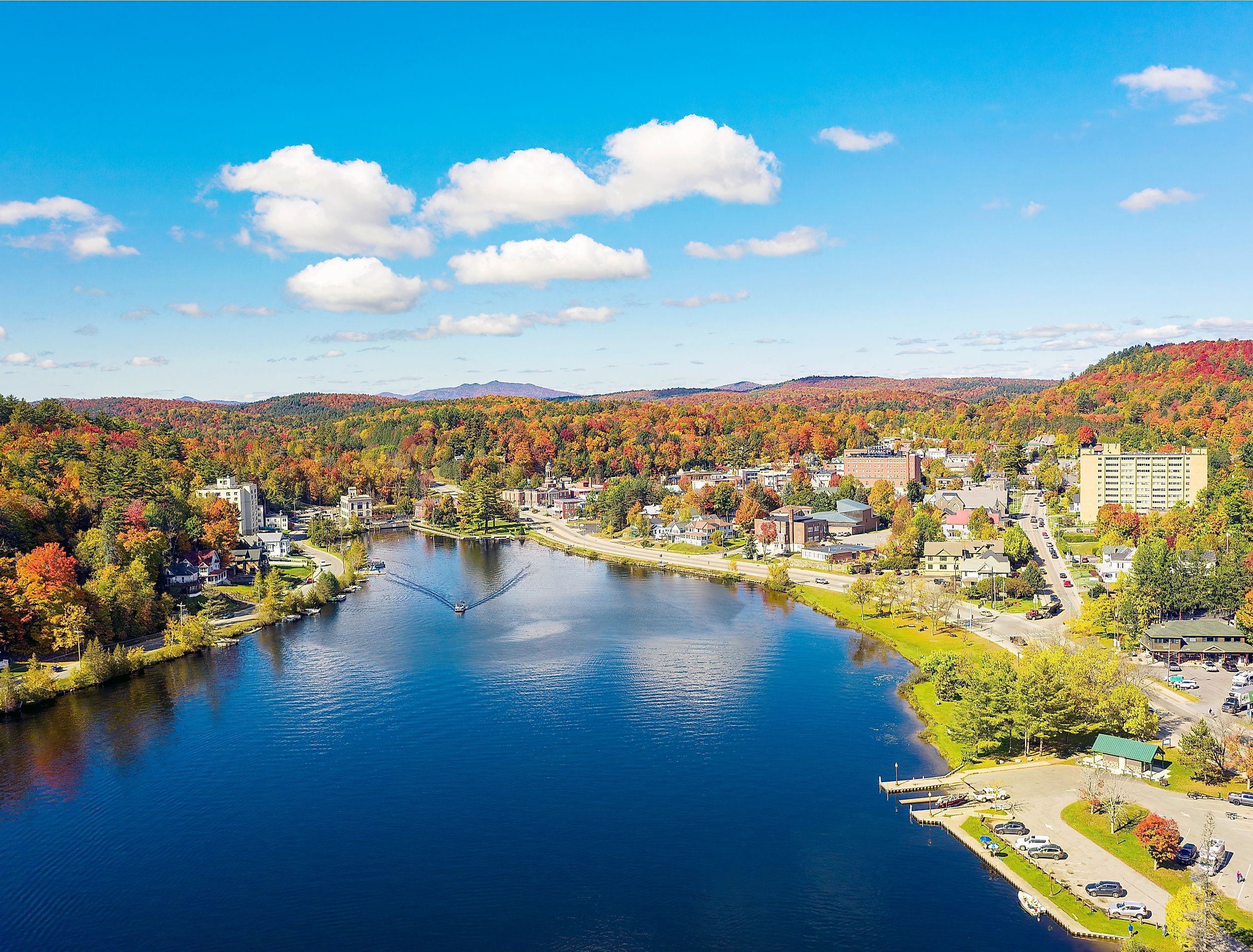 Colorful aerial view of Saranac Lake New York in the Adirondack Mountains during the fall.