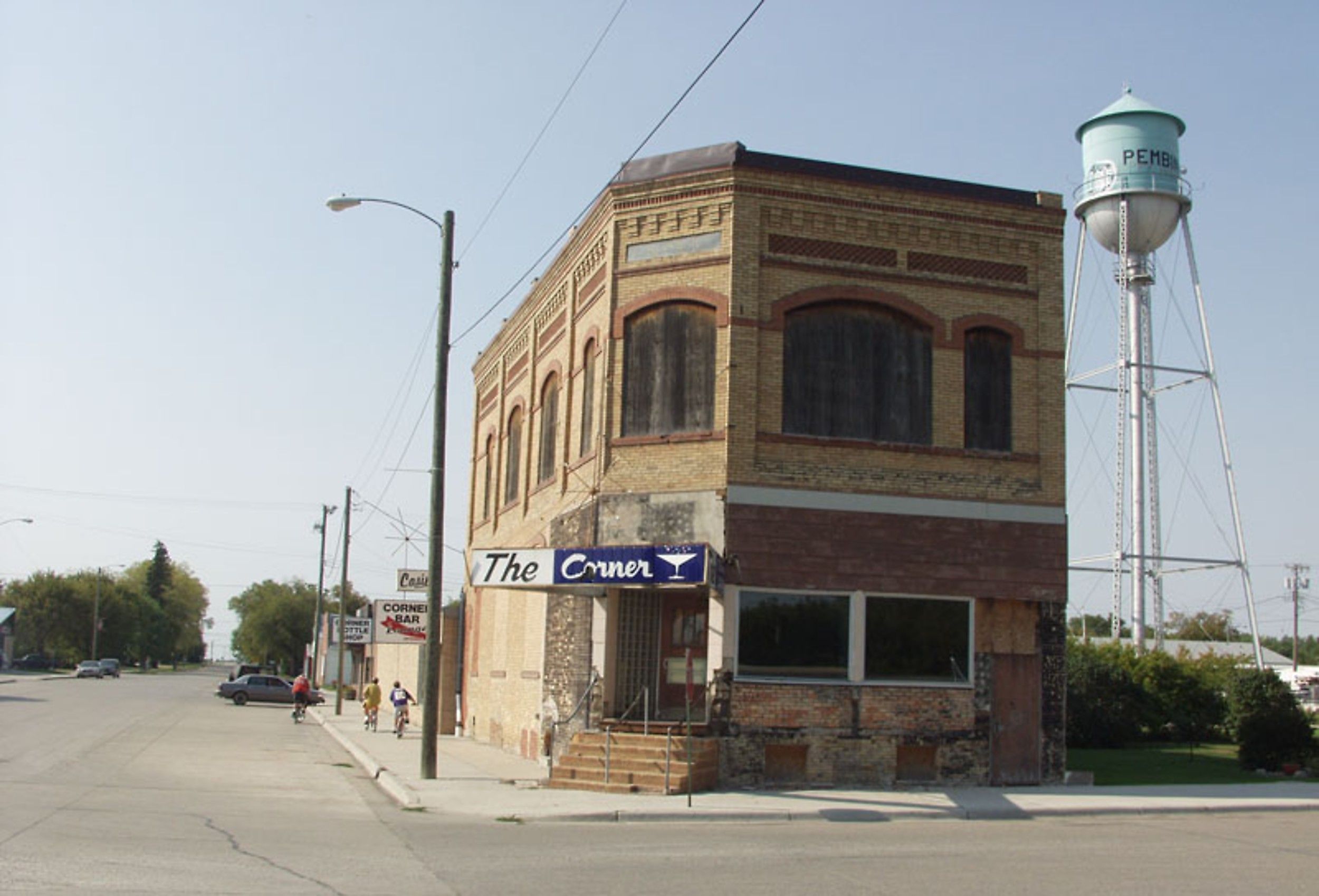Historic building and water tower in Pembina, North Dakota. Image credit Andrew Filer from Seattle (ex-Minneapolis), CC BY-SA 2.0 <https://creativecommons.org/licenses/by-sa/2.0>, via Wikimedia Commons