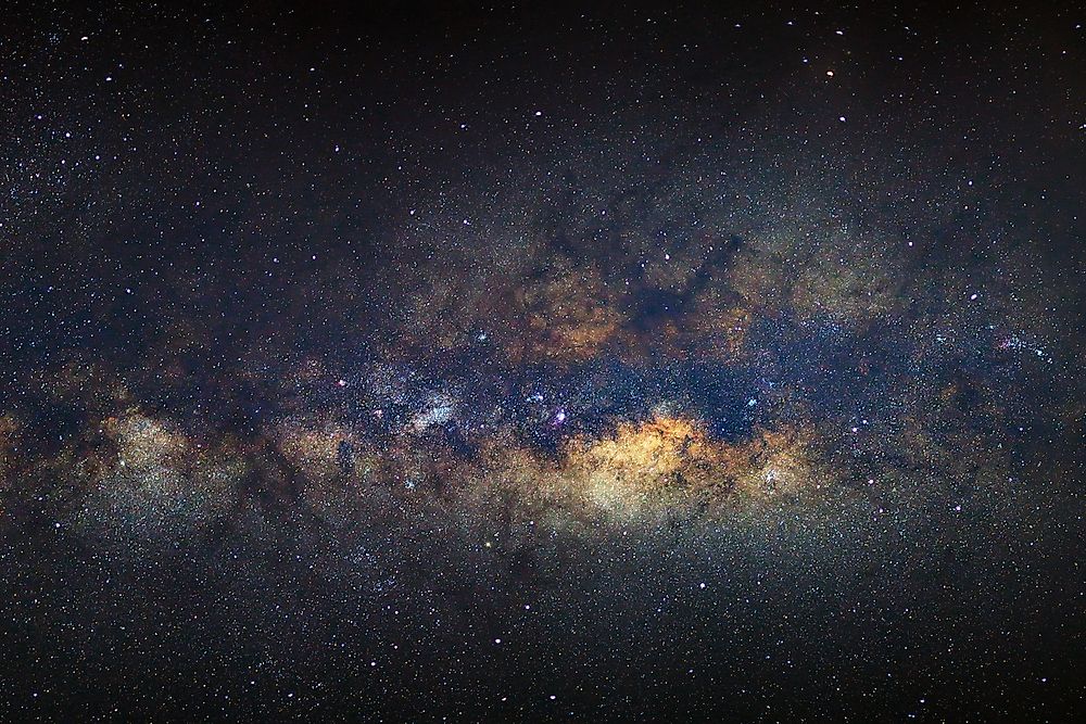 Interstellar dust gives the Milky Way's galactic center a smog-like appearance.