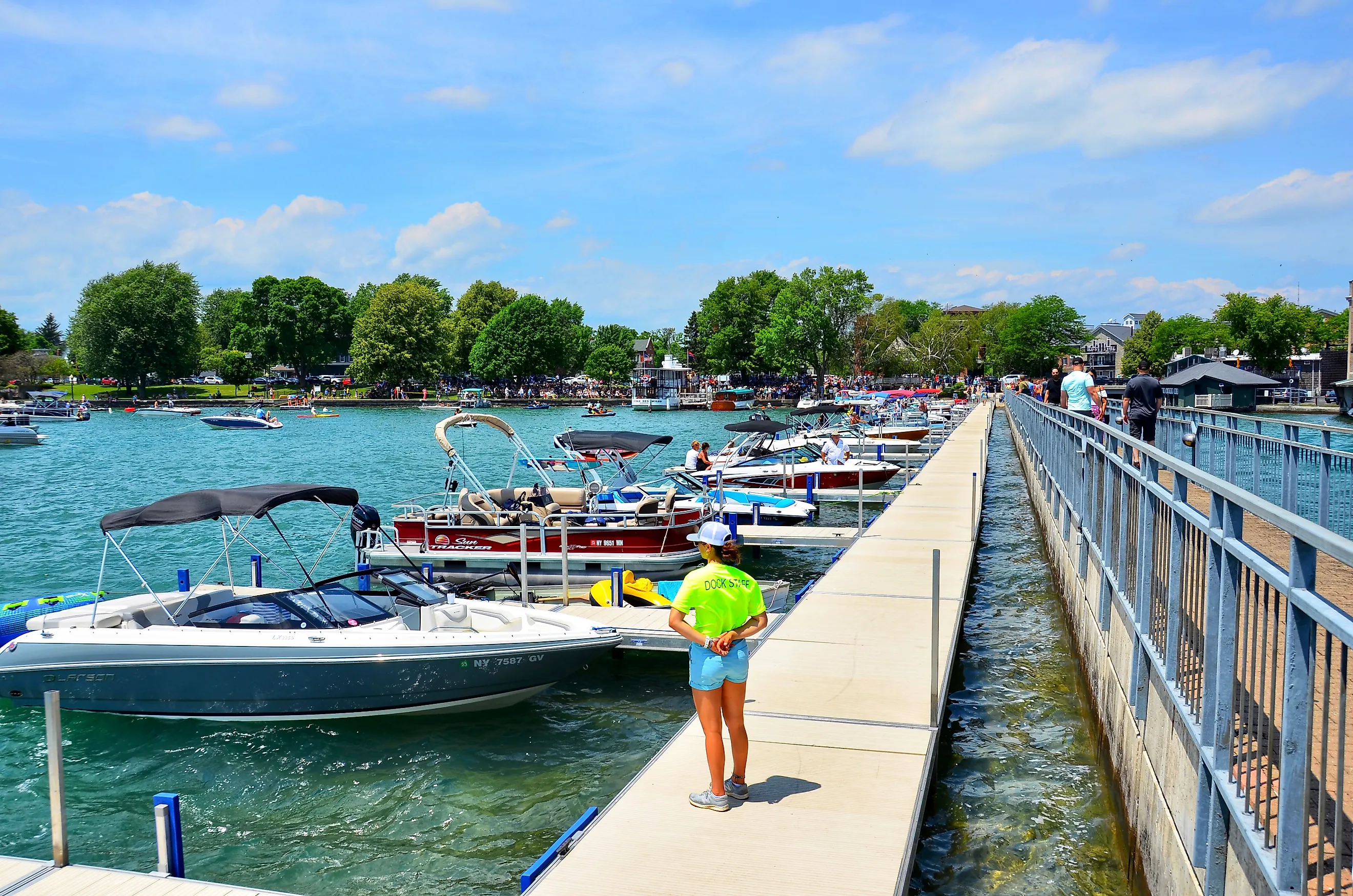  Pier and luxury boats docked in the Skaneateles Lake. 