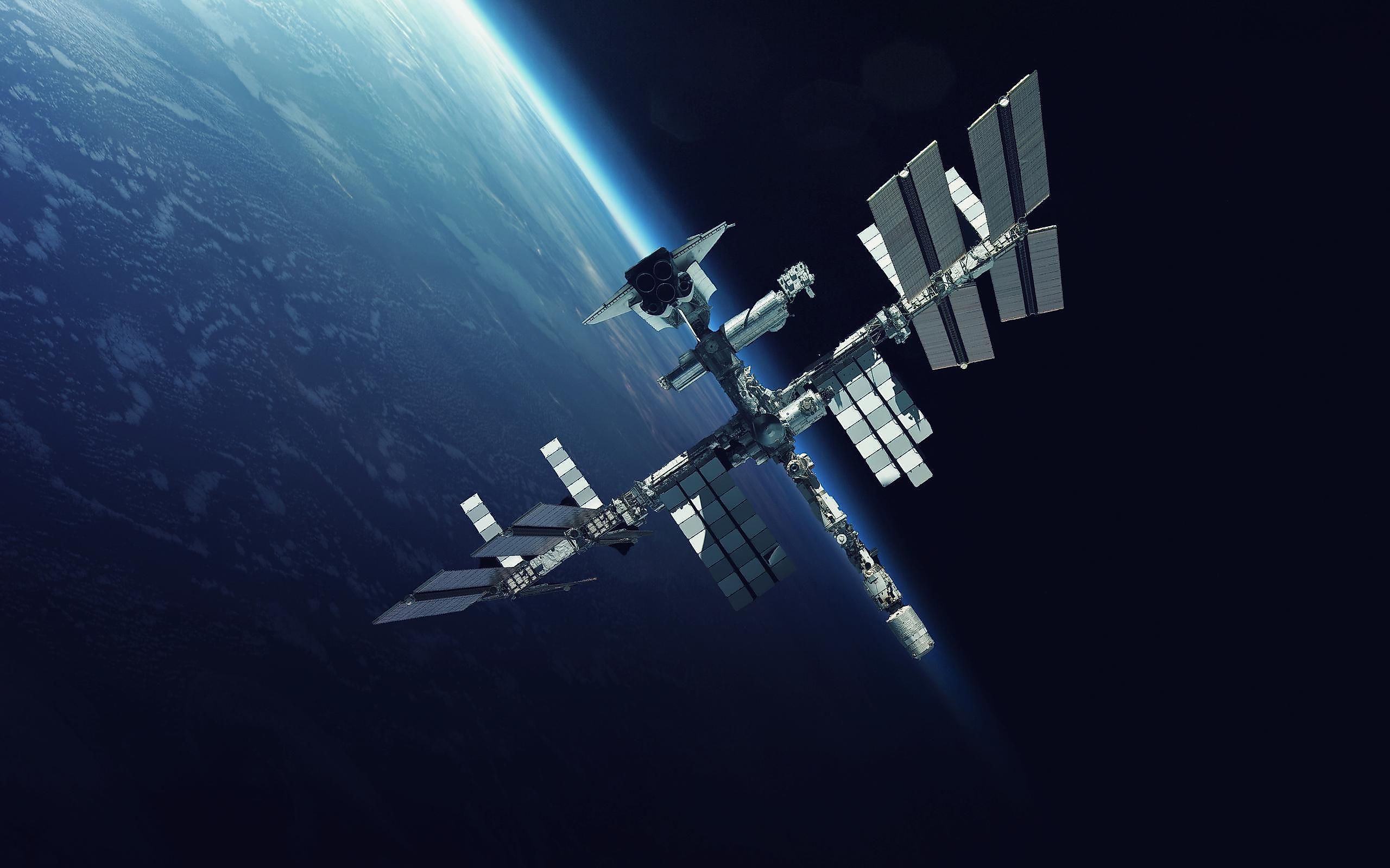 The International Space Station looking over Earth.