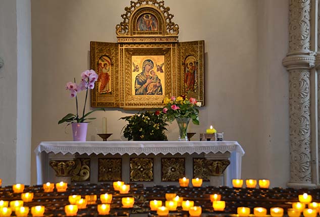candle offering st peter's cathedral