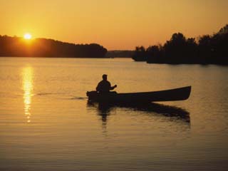 Georgia, Canoe on a Lake at Sunrise