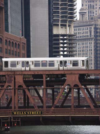 An El Train on the Elevated Train System Crossing Wells Street Bridge, Chicago, Illinois, USA