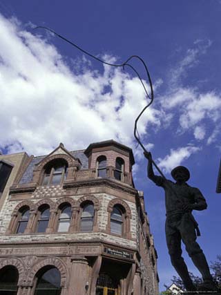 Bullwhacker Statue and Securities Building on Last Chance Gulch, Helena, Montana, USA