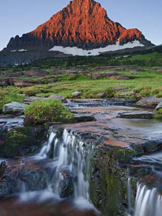Mount Reynolds in Early Morning Light and a Seasonal Waterfall, Glacier National Park, Montana, USA
