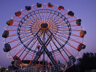People Ride an Upsidedown Ferris Wheel in Wildwood, New Jersey