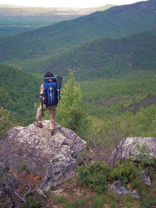 Woman Backpacker Looking at the Valley in Shenandoah National Park