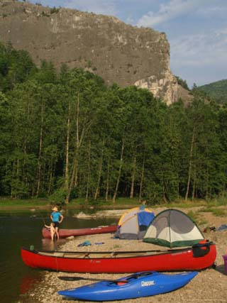 Mother and Son Canoe Camping Along the Potomac River